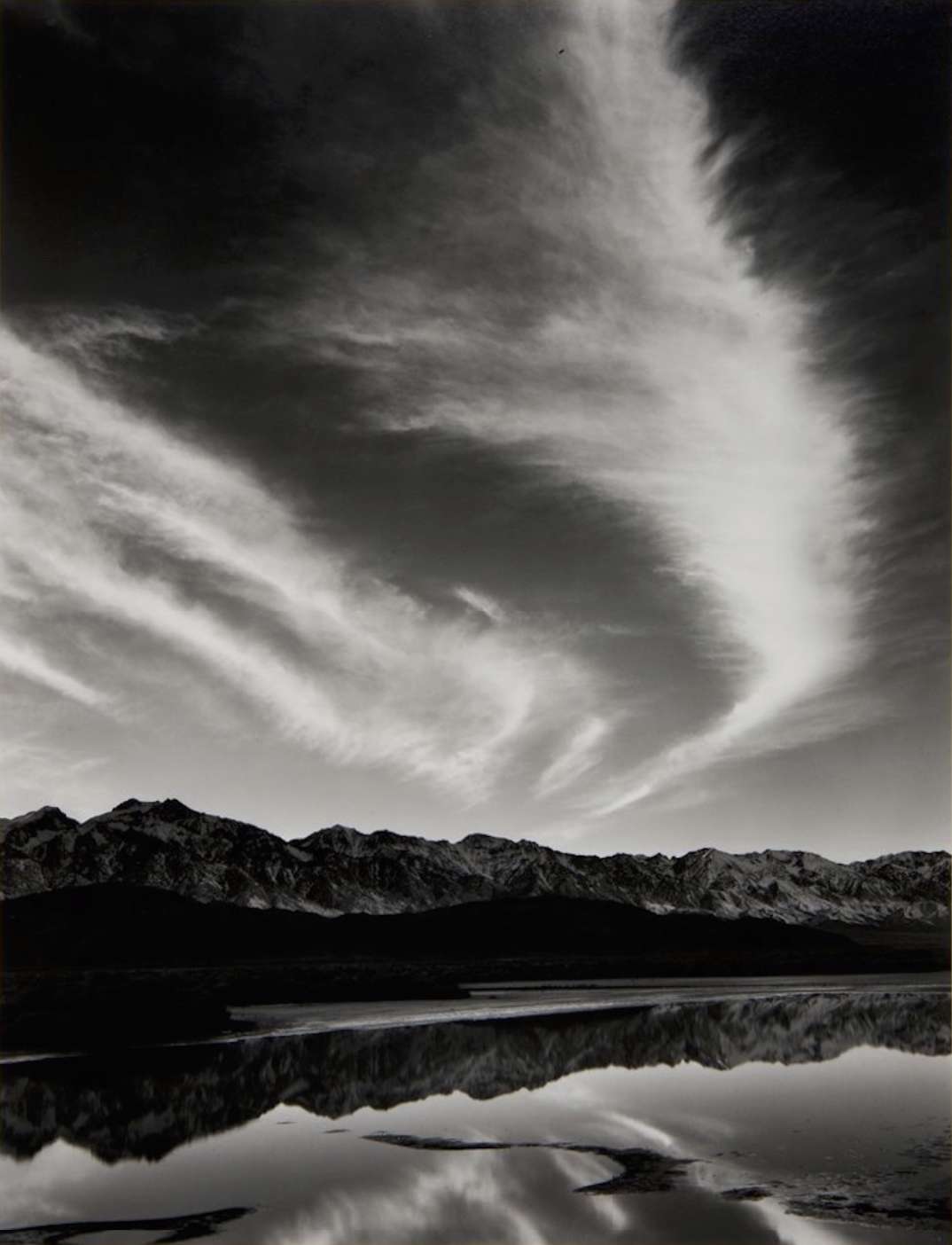 Ansel Adams, Sierra Nevada, Winter Evening, from the Owens Valley, 1962 From Portfolio Four: What Majestic Word. Print # XV. Published in 1963 by the Sierra Club San Francisco, 1962