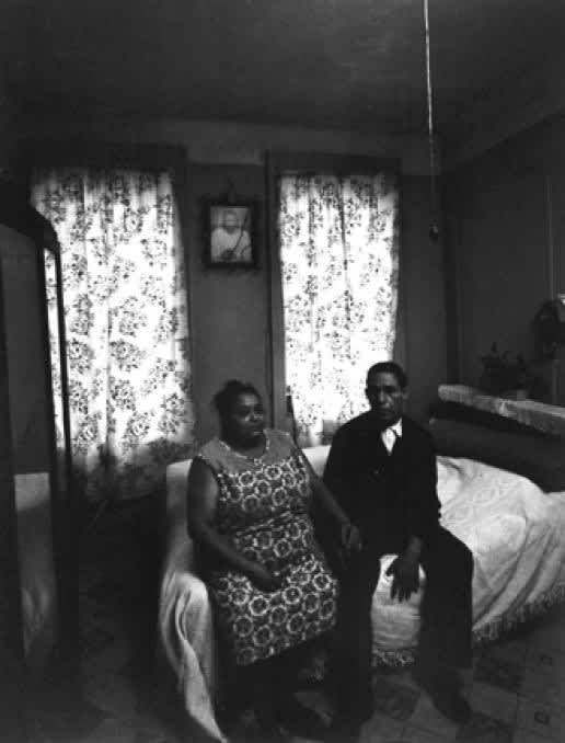 Untitled, East 100th Street (Elderly Couple on Bed with Christ on Wall), 1966 - 68