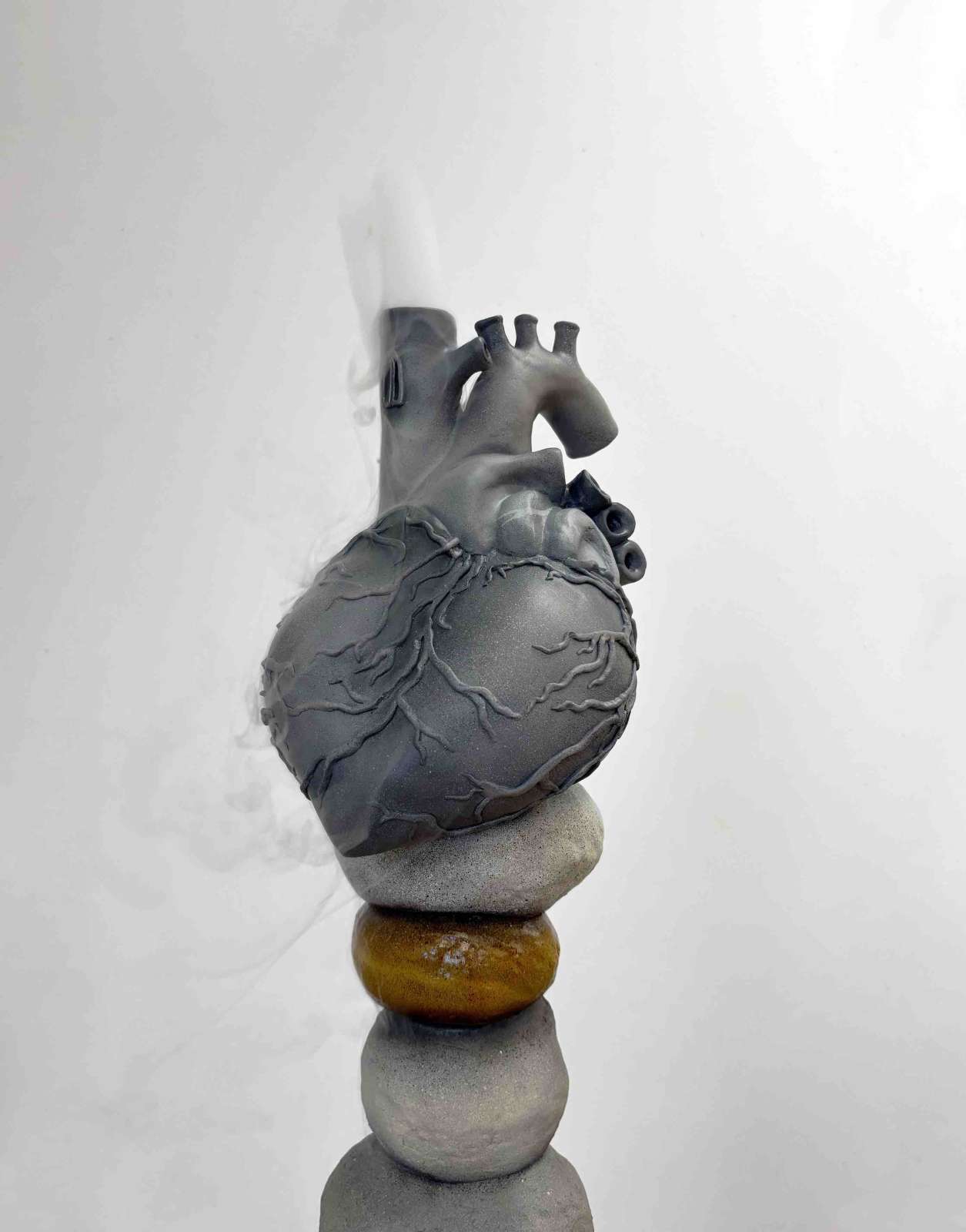 Ilaria Vinci, 'Crushing all the intruders', 2025, Mixed media, smoke machine, 130 x 30 x 30cm. Courtesy of the artist and Alice Amati.