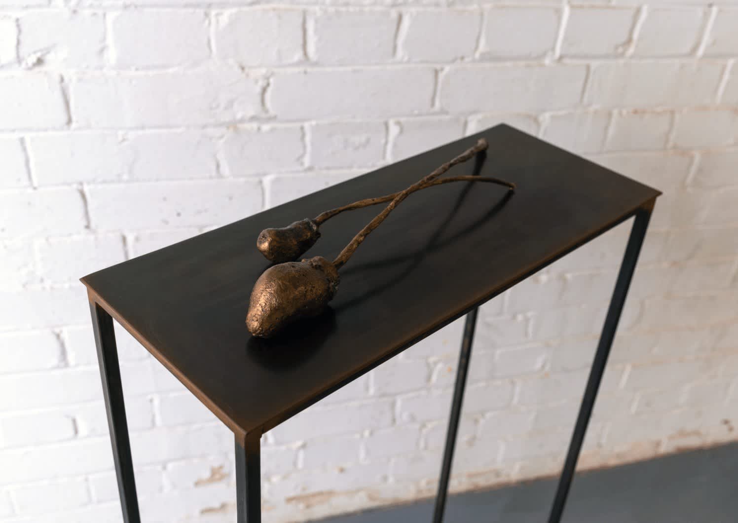 Shiraz Bayjoo, 'Baobab', 2025, Brass, Artwork in 2 parts: 39 x 4 x 4 cm and 27 x 4 x 2 cm.  Courtesy of the Artist and Copperfield, London.