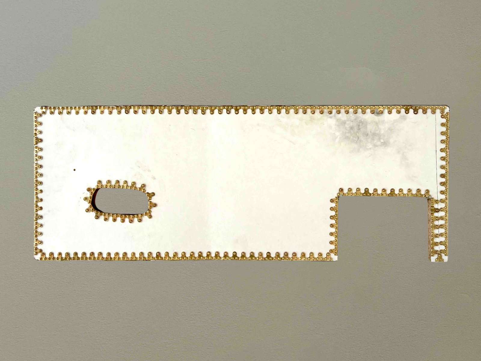 Nicky Hirst, 'New Museum', laminated chipboard and brass', 36 x 96cm, 2025. Courtesy of the artist and domobaal.