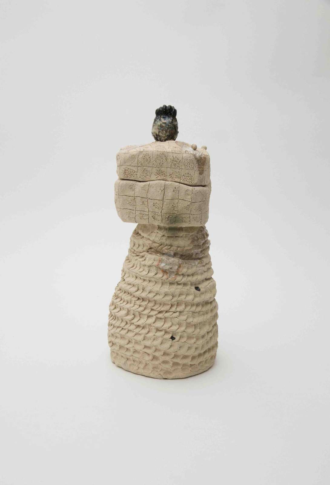 Soyoung Hyun, 'Purification Connection', 2025, stoneware, volcanic stones from Mount Etna and glass bisque, 11 x 31cm. Courtesy of the artist and IMT Gallery