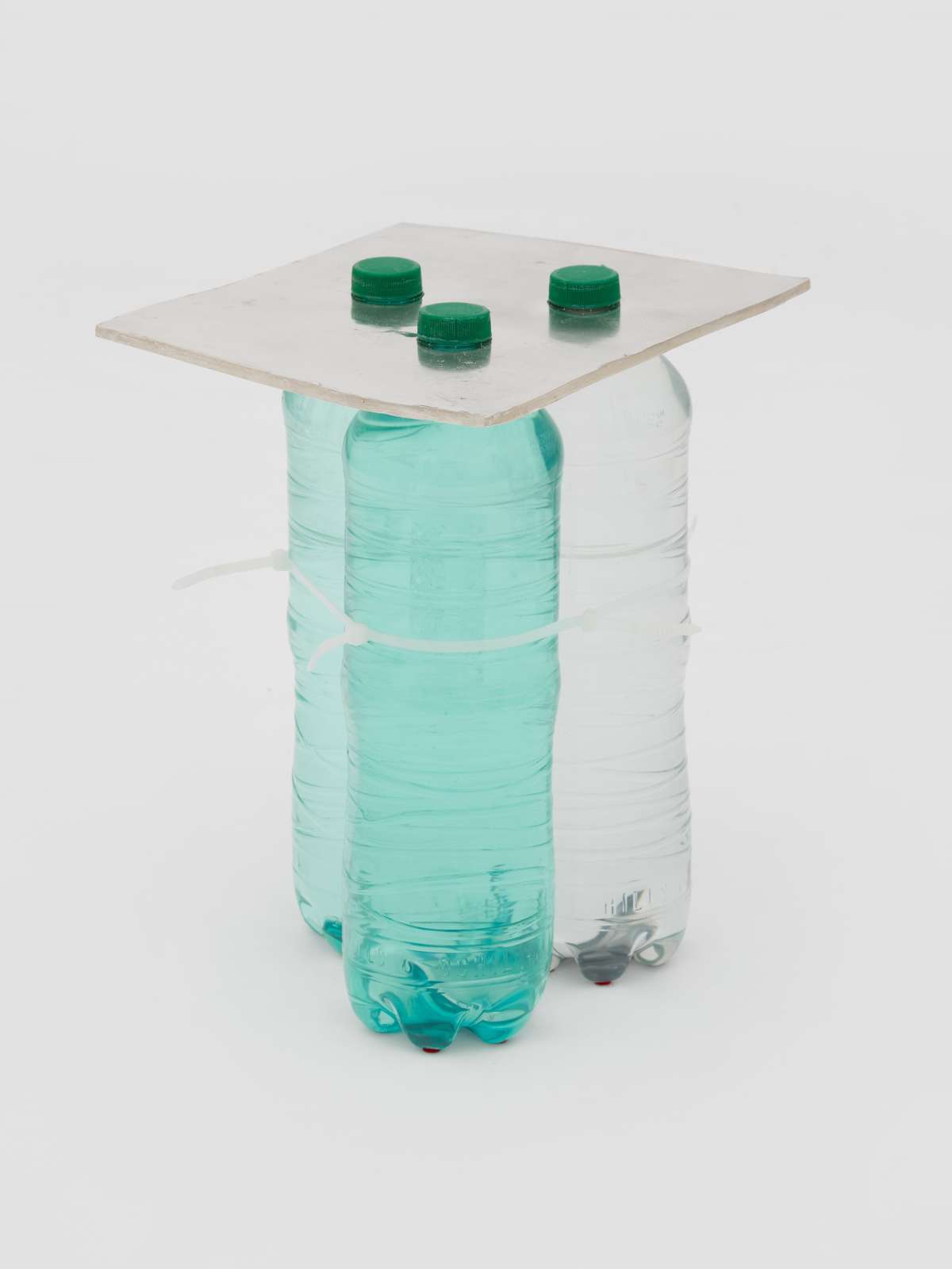 Amanda Moström, 'Sucking Ice 3', 2023, Bottles, water, zip ties, silver-plated bronze, 35 x 30 x 32cm  Courtesy of the Artist and Rose Easten, London