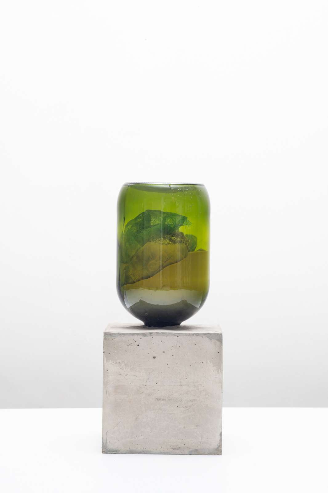 Alexandre da Cunha; 'Formula (Shift)', 2023, shoe sole, scourer, keys, paper note, coins, brush, mesh, clay powder, turmeric, concrete, 45.5 x 20 x 20 cm, 18 x 7 3/4 x 7 3/4 in. © Alexandre da Cunha. Courtesy the artist and Thomas Dane Gallery. Photo: © Edouard Fraipont.