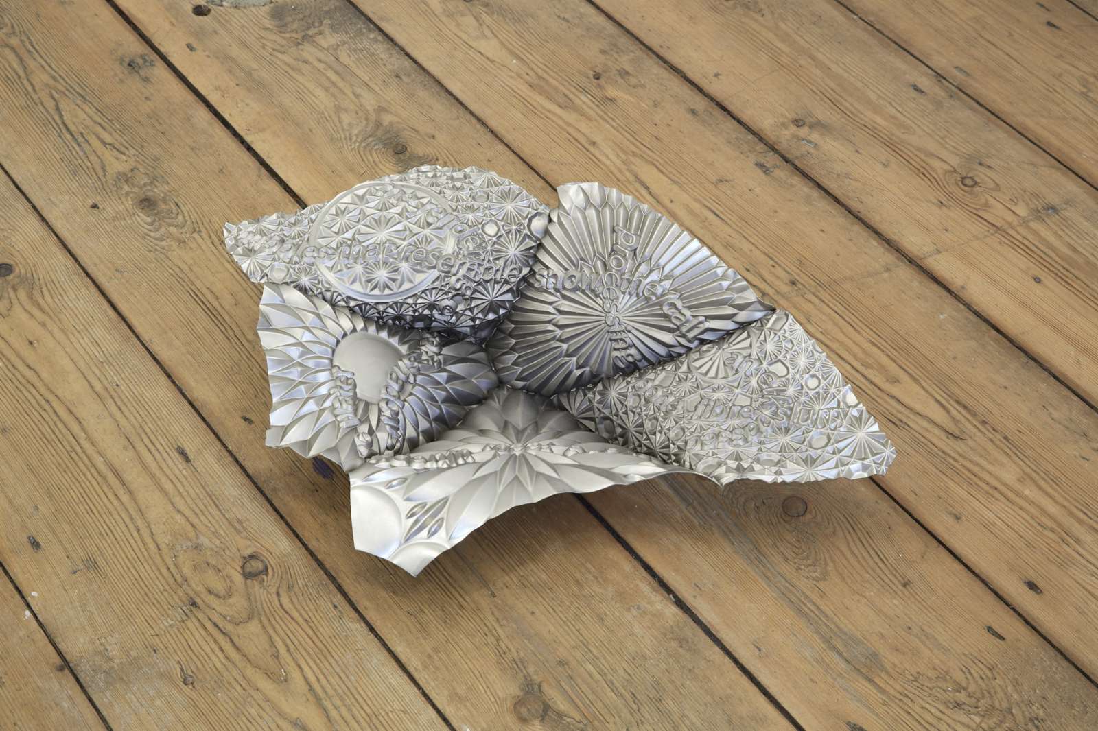 James Fuller, 'Slow scroller (the rendering of soft shadows)', 2024. Nickel plated copper, 50(L) x 32(W) x 11(D) cm.