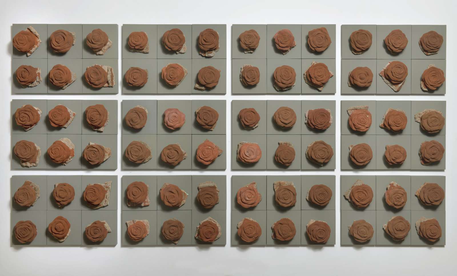 Girjesh Kumar Singh, 'Plucked for the sake of the Gods', 2018. Bricks and mortar mounted on panel, 109x214x10cm. Set of 72 roses (18x18x11.50cm each).