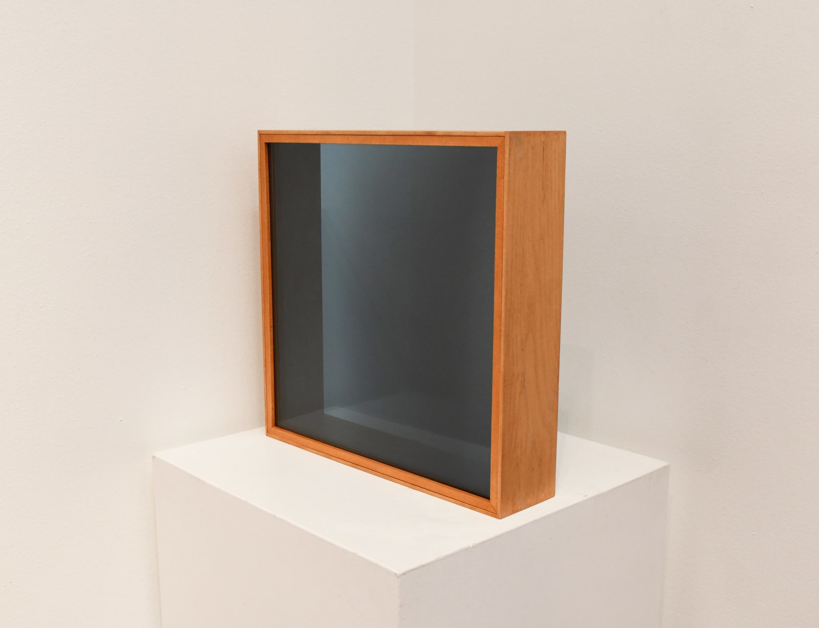 glass cube by Larry Bell