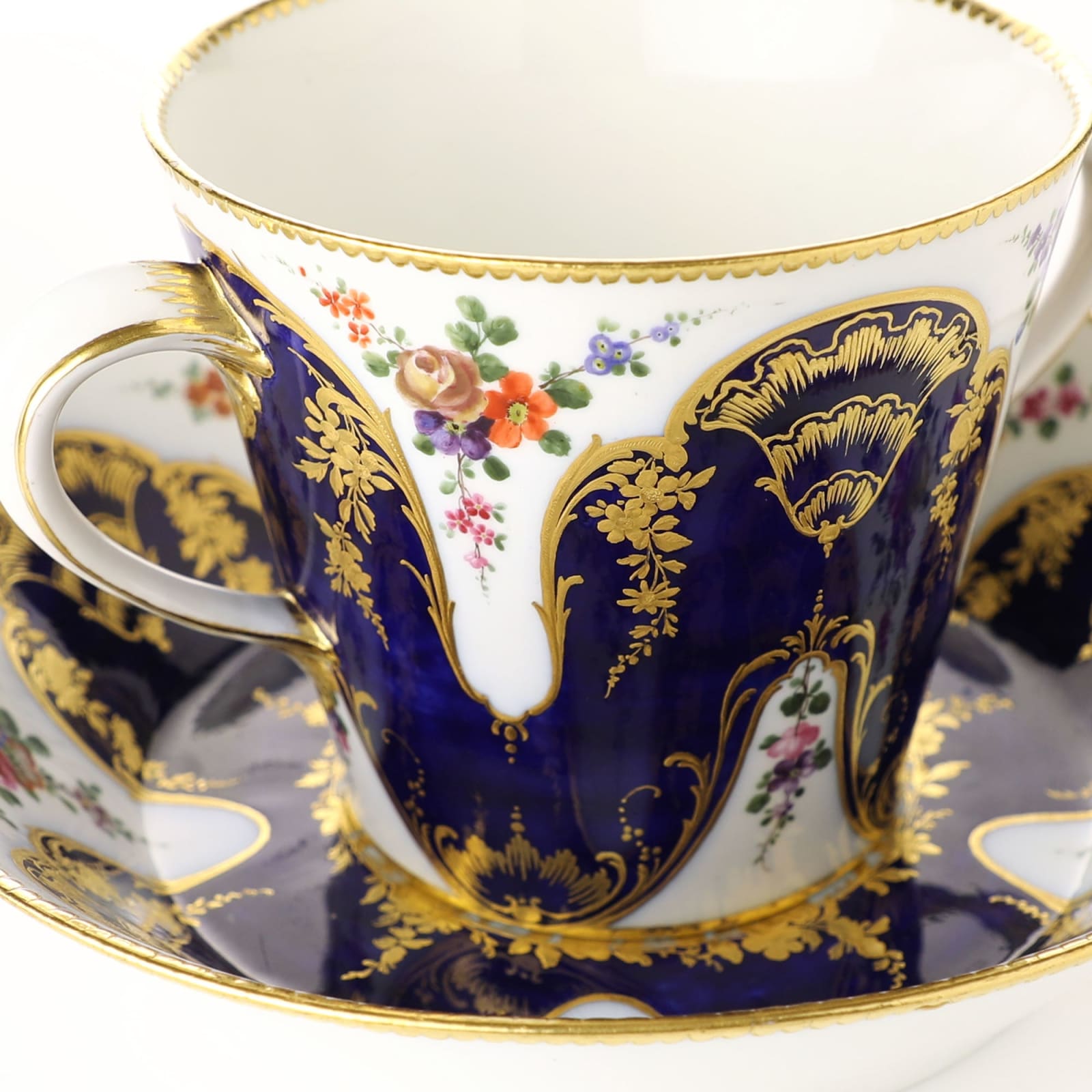 Sèvres Porcelain, A Sèvres Soft-Paste Porcelain Two-handled Milk Cup and Saucer, 1758