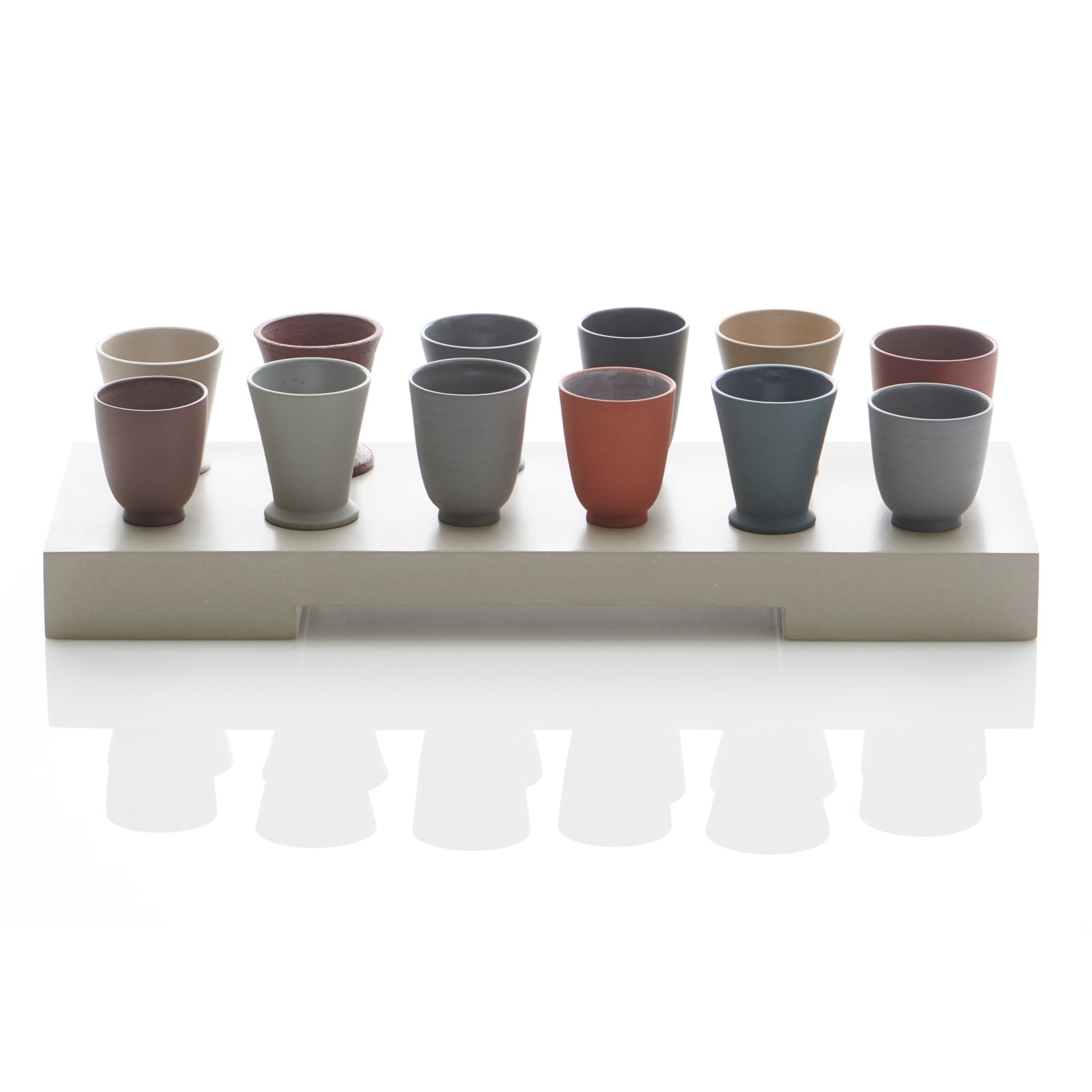 Julian Stair, Twelve Cups and Beakers on a Ground, 2018