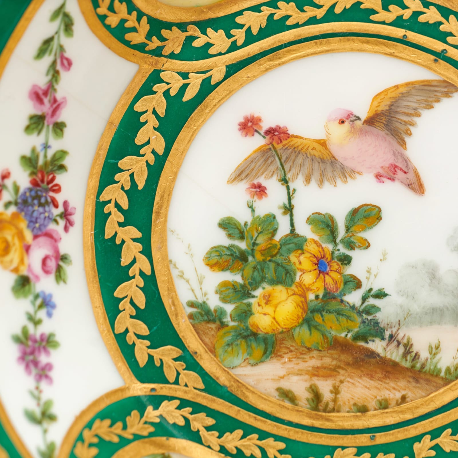 Sèvres Porcelain, A Sèvres Porcelain Cup & Saucer painted with birds by Armand, 1772