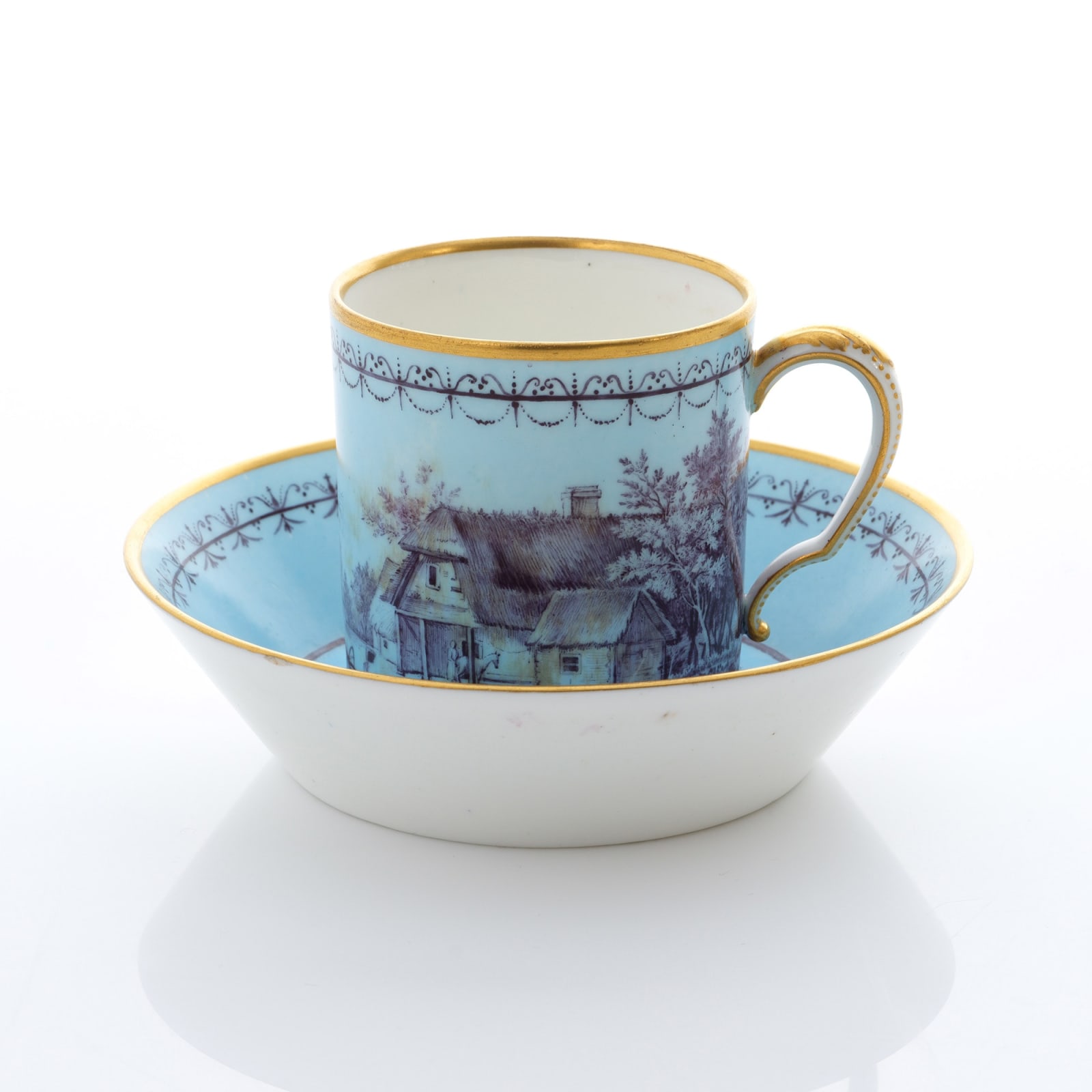 Sèvres Porcelain, A Soft-Paste Sèvres Porcelain Pale Blue Ground Cup & Saucer, 1787
