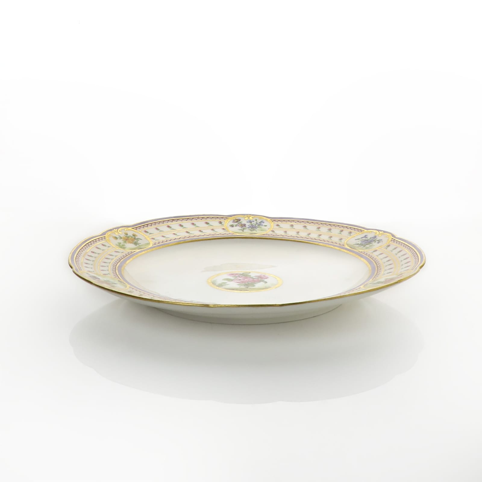 Sèvres Porcelain, A Soft-Paste Sèvres Porcelain Plate, made for use at Versailles, 1783