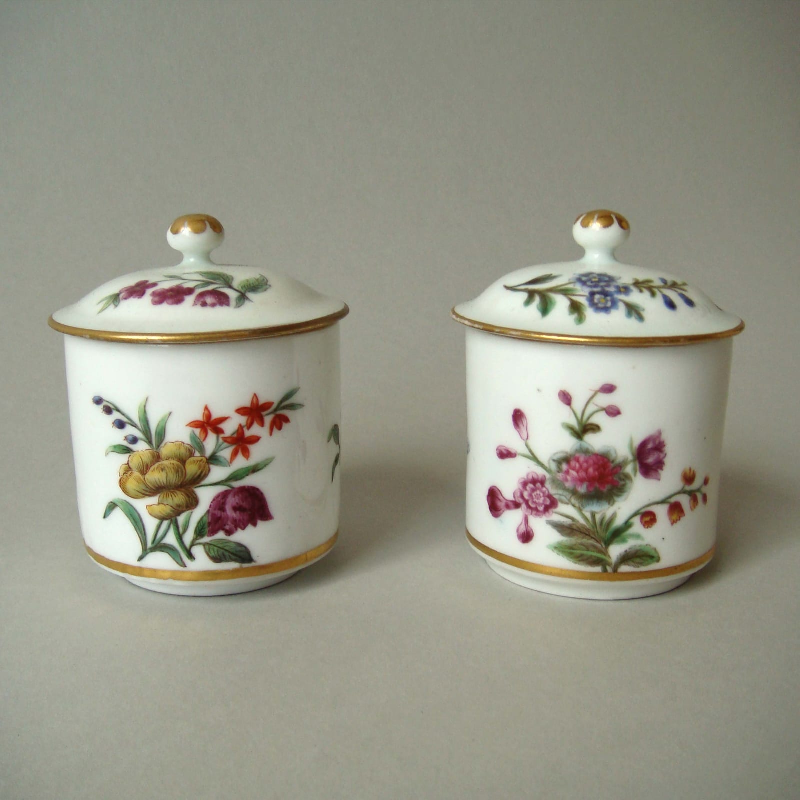 Sèvres Porcelain, A Pair of Lidded Vincennes Soft Paste Porcelain Pommade Pots, circa 1750