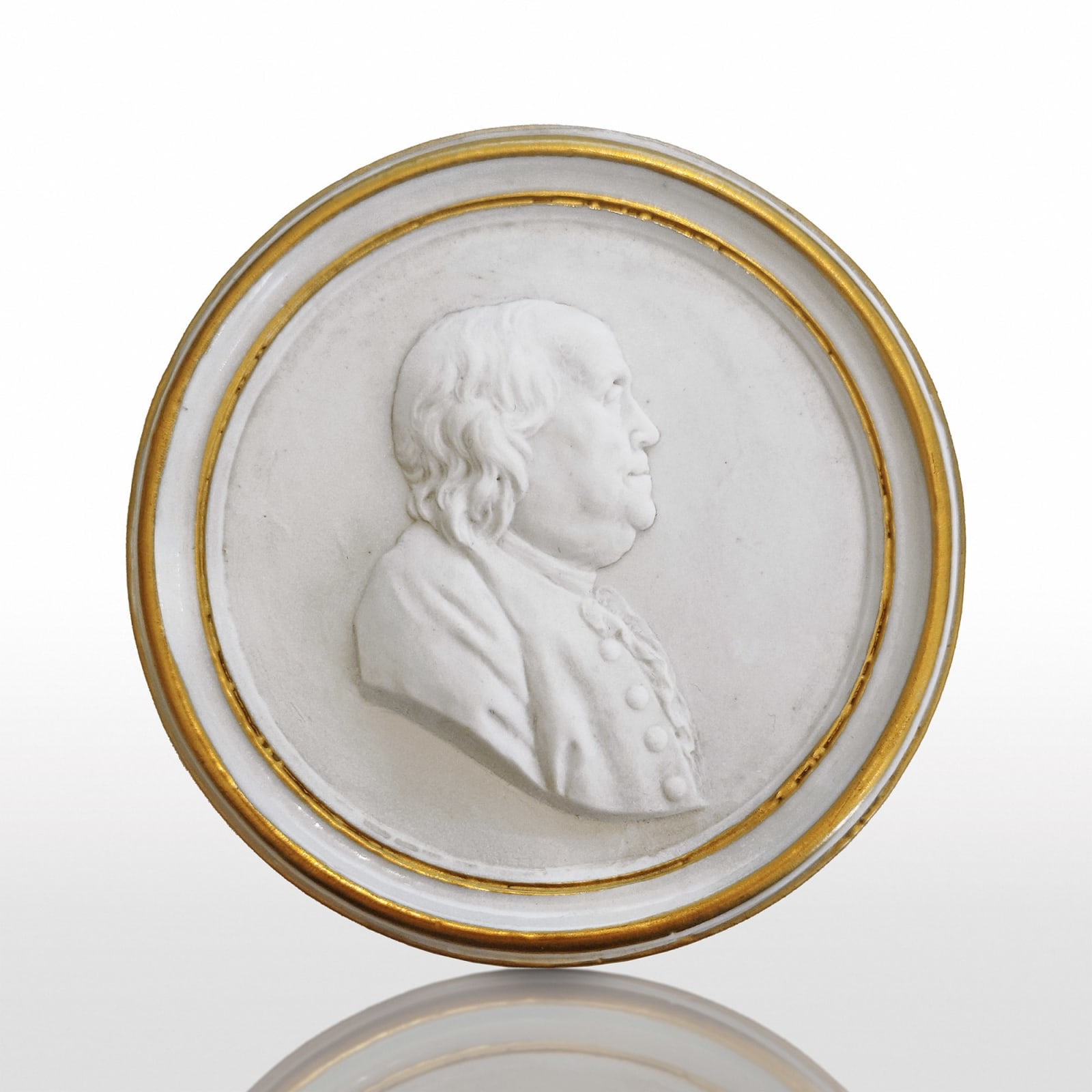 Sèvres Porcelain, A Hard-Paste Sèvres Porcelain Medallion of Benjamin Franklin, 1778