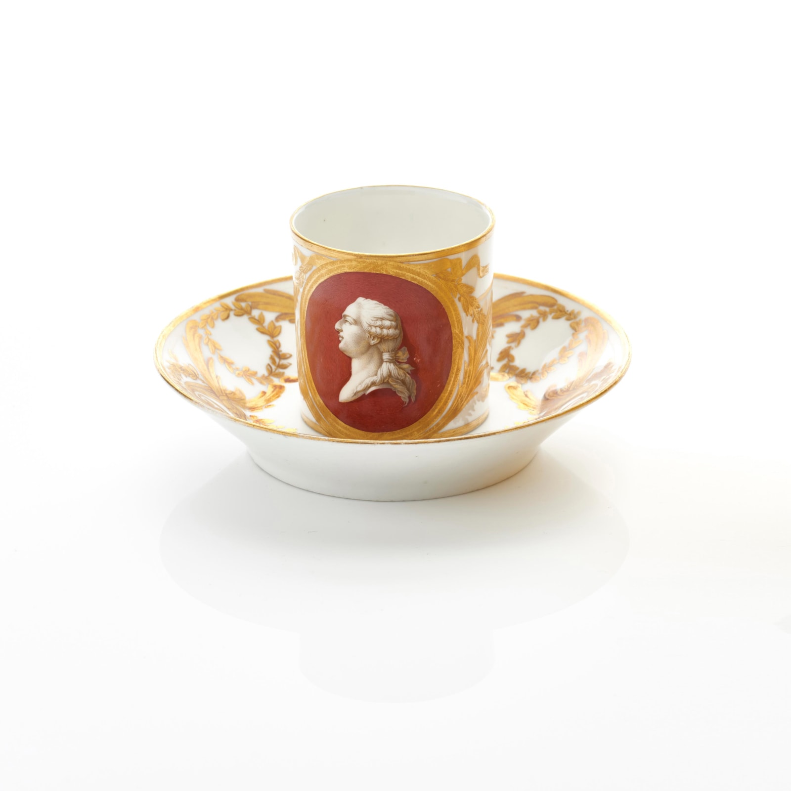 Sèvres Porcelain, A Hard-Paste Sèvres Porcelain Cup with portrait of Louis XVI and later saucer, circa 1775