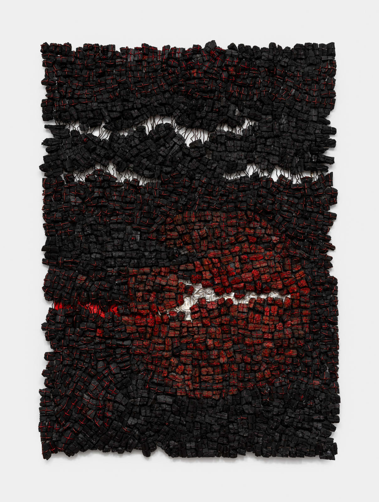 Eva Obodo. Nigerian Artist. Contemporary African Art. Nsukka school. Large-scale installations. Charcoal and rope sculptures. Fabric, burlap, and natural fibers. Tactile textures. Material hybridity. Memory and identity. Cultural narratives. Contemporary conceptual frameworks. Craftsmanship. Resilience. Contemporary culture