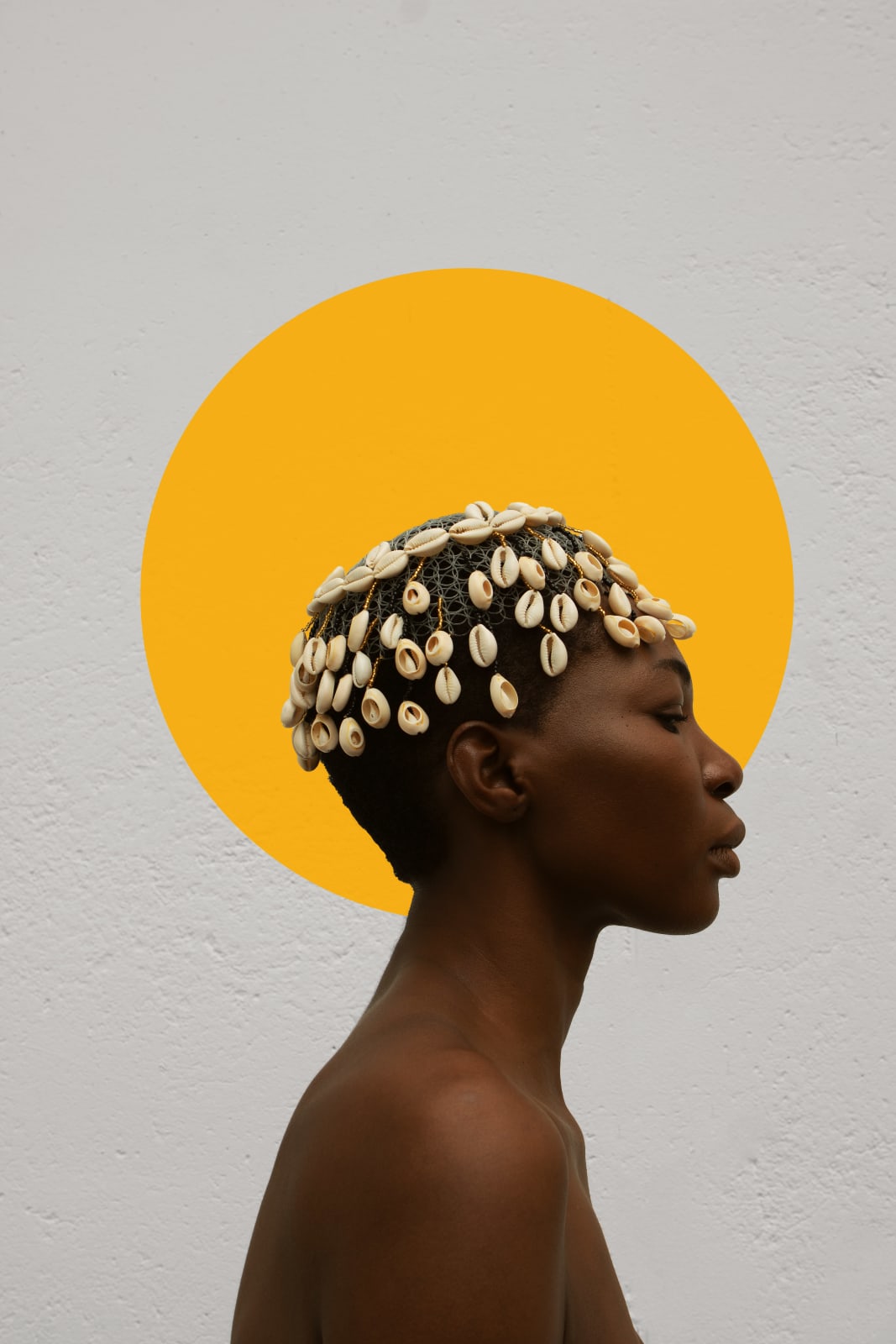 Marc Posso photograph. Gabonese Artist. Young artist. Contemporary african art in Paris. AFIKARIS Gallery. Self-taught Photographer. Figurative photography. Photography printed on canvas. Diversity of the African continent. Bold colors. Contrast of colours. Black beauty.