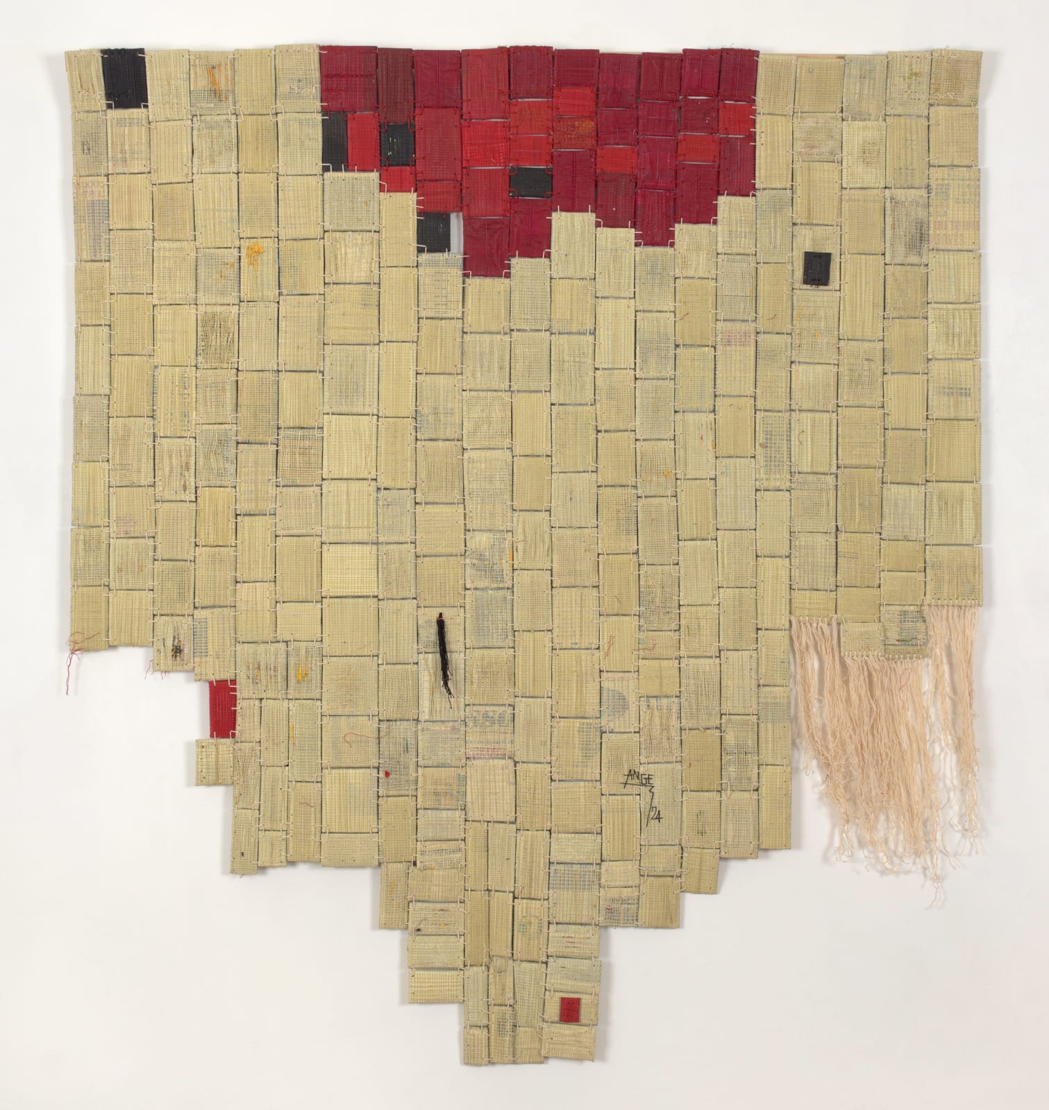 Ange Dakouo. Malian Artist. Contemporary African Art in Paris. AFIKARIS. Wall tapestries. Traditional artisanal techniques. Contemporary conceptual frameworks. Malian culture. Hybridity of techniques. Resilience. Global inequalities. Textile Artworks. Craftsmanship.