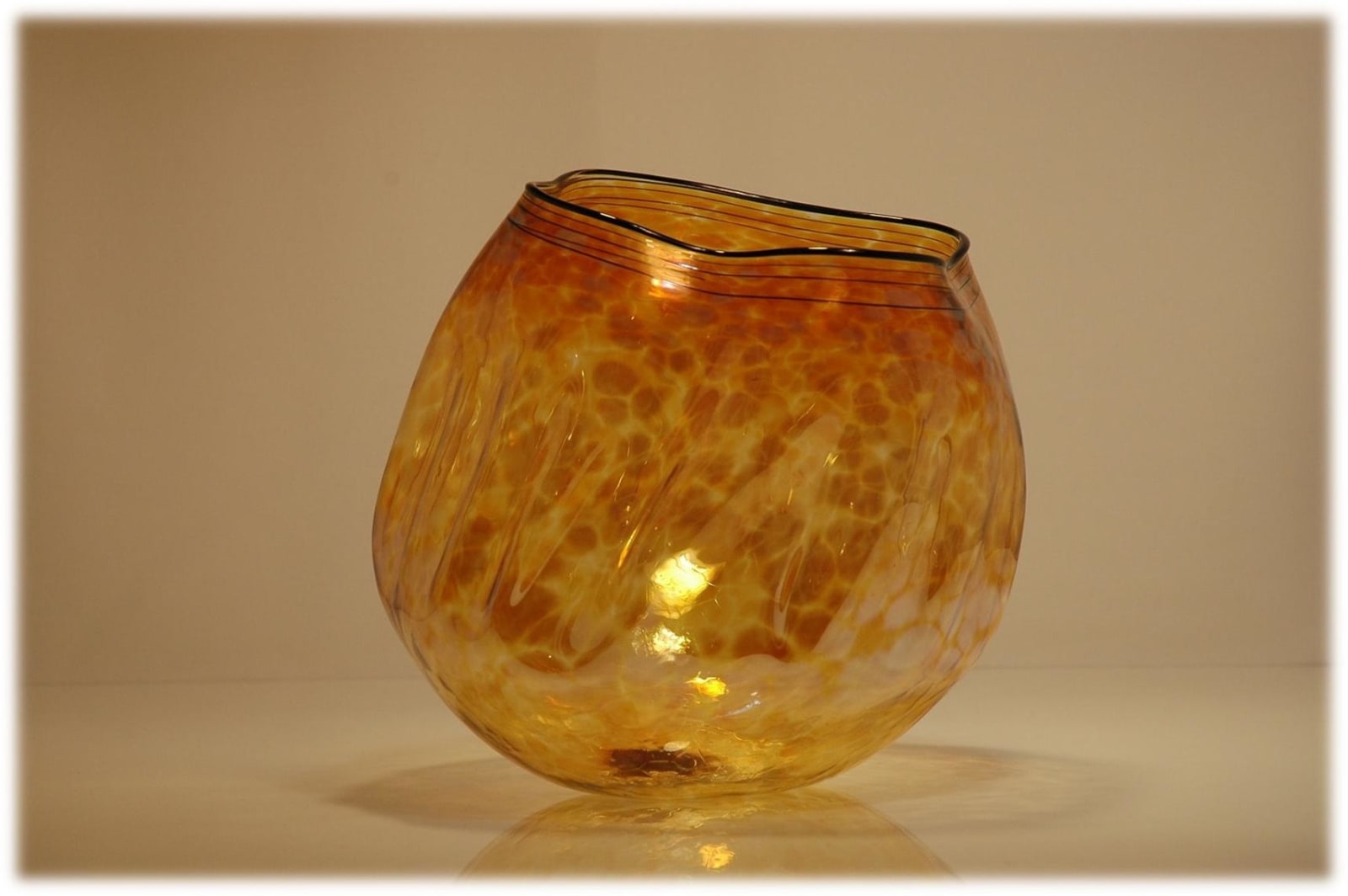 Robert Kaindl, Topaz Amber Gold Black Lip Wrap