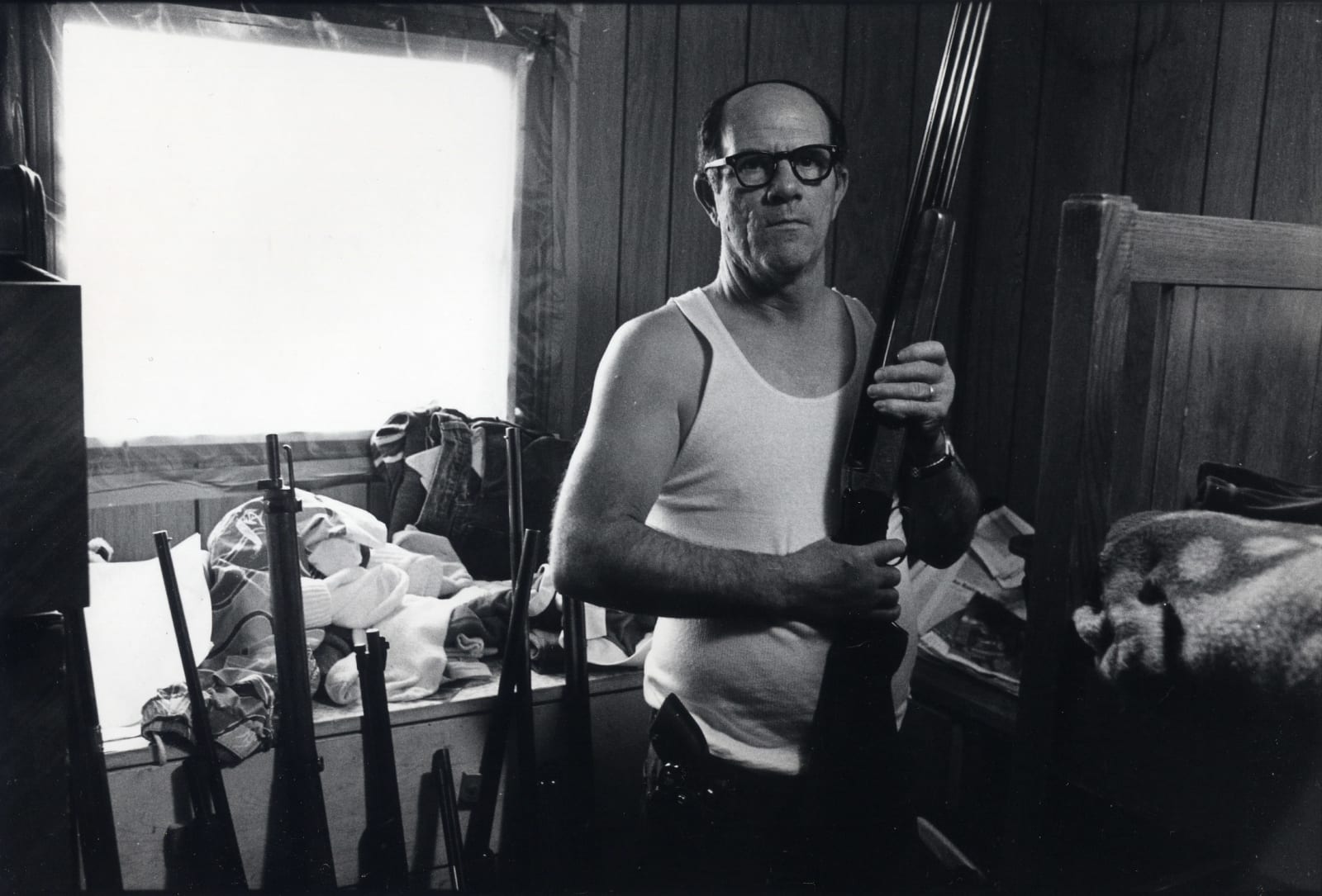 Bertien van Manen, Junior with his gun collection, Cumberland, Kentucky, 1987