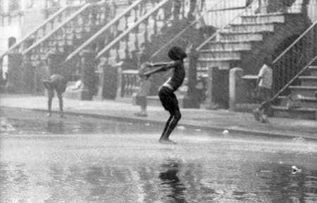 Chester Higgins, Sprinkler Cool Off, Harlem, 1969
