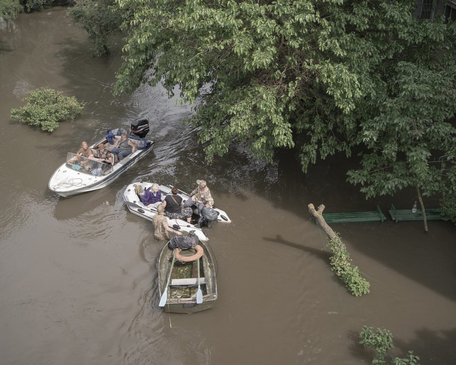 Johanna-Maria Fritz, Volunteers Viktor and Oleksandr help evacuate Maria and her daughter Svitlana from their home, 2023