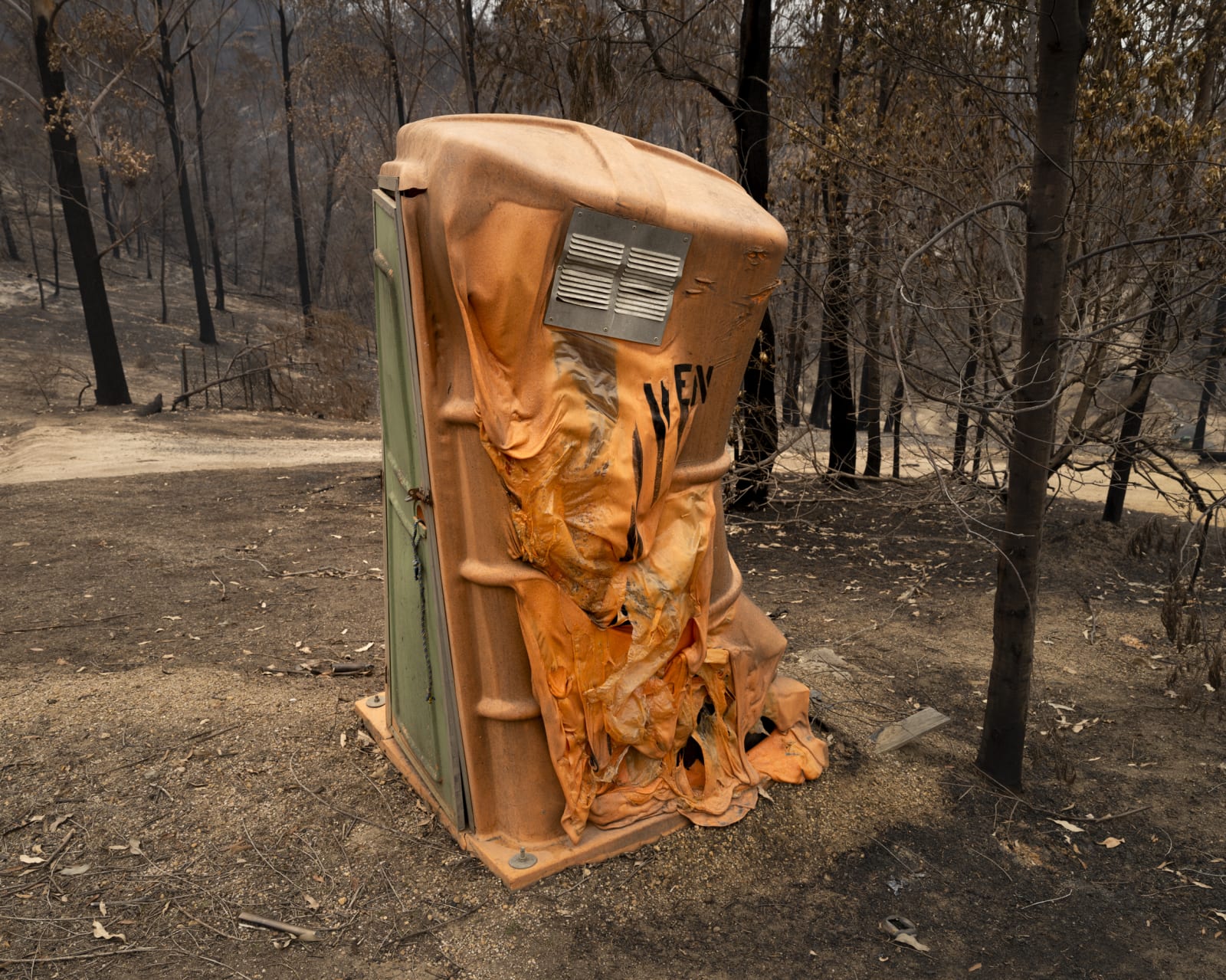 Gideon Mendel, Burnt portable toilet. Upper Brogo, New South Wales, 2020