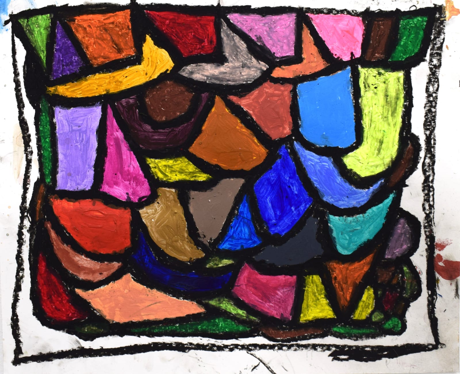 A colorful array of shapes surrounded by a black border.