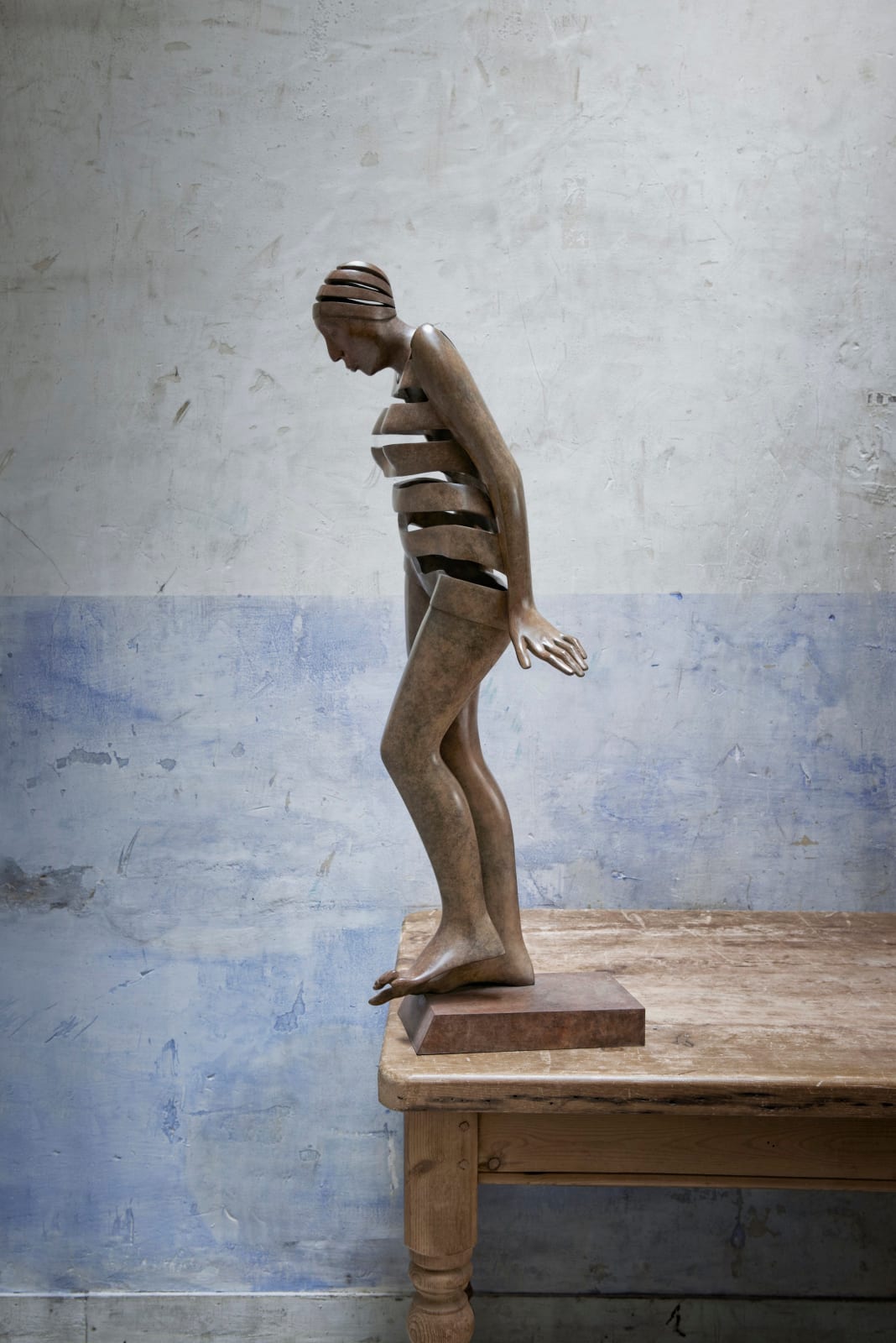 Isabel miramontes contemporary bronze sculpture abstract art sculpture decoration design minimalism bather woman in swimming suit before jumping in swimming pool garden sculpture