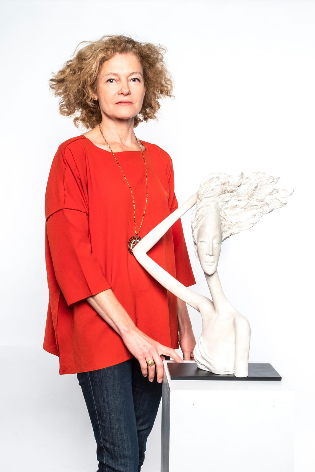 windy woman sculpture Hedwige Leroux contemporary sculpture bronze sculpture woman with hair blowing into the wind interior design at hotel Barsey by Warwick Art Yi gallery Brussels art gallery