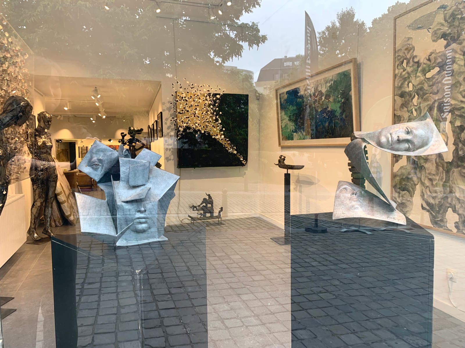kubieke hedendaagse bronzen sculptuur gezichtssculptuur paola grizi italiaanse beeldhouwkunst art yi brusselse kunstgalerij