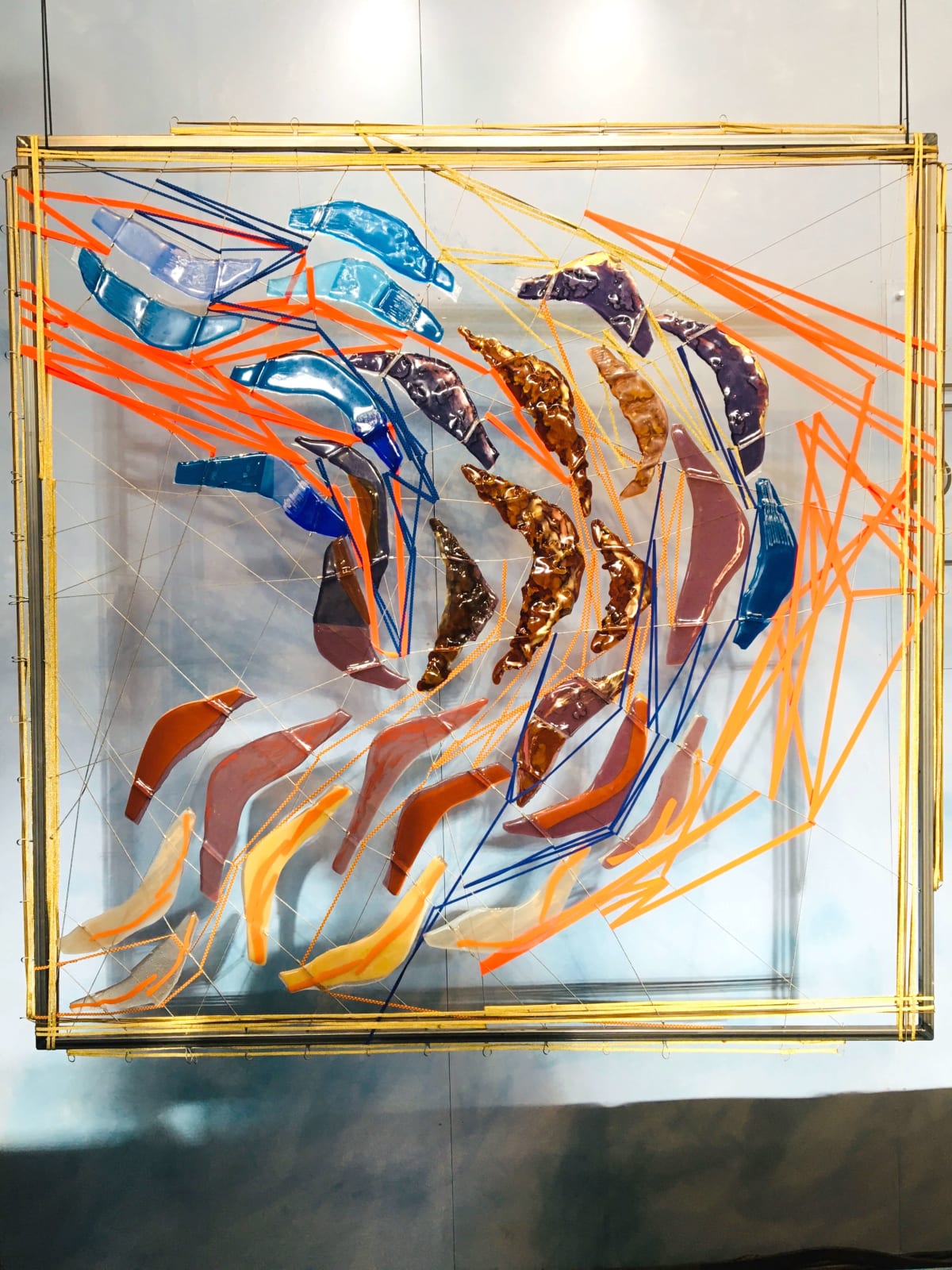 between the lines contemporary art wall installation glass art mixed media maison Fabienne Decornet interior design abstract art red and gold fishes Art Yi Gallery Brussels art gallery