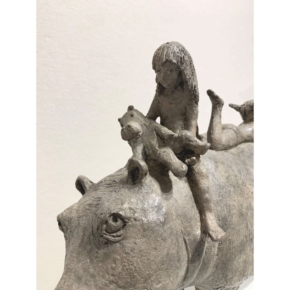 The nurses hippo playing with little girl cute animal and child contemporary bronze sculpture sophie verger