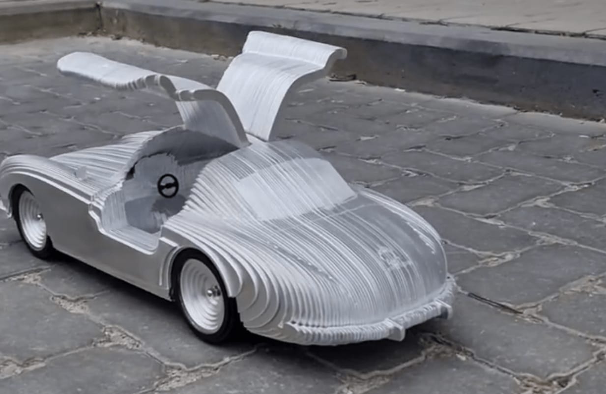 BENZA fancy silver racing car sculpture Jean Paul Kala contemporary sculpture car lover Art Yi gallery Brussels art gallery