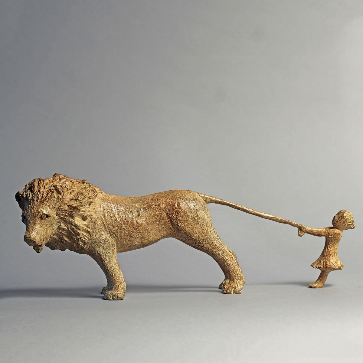 a cute girl stay with a baby lion contemporary bronze sculpture interior design sophie verger art gallery brussels a cute girl stay with a baby lion contemporary bronze sculpture interior design sophie verger art gallery brussels