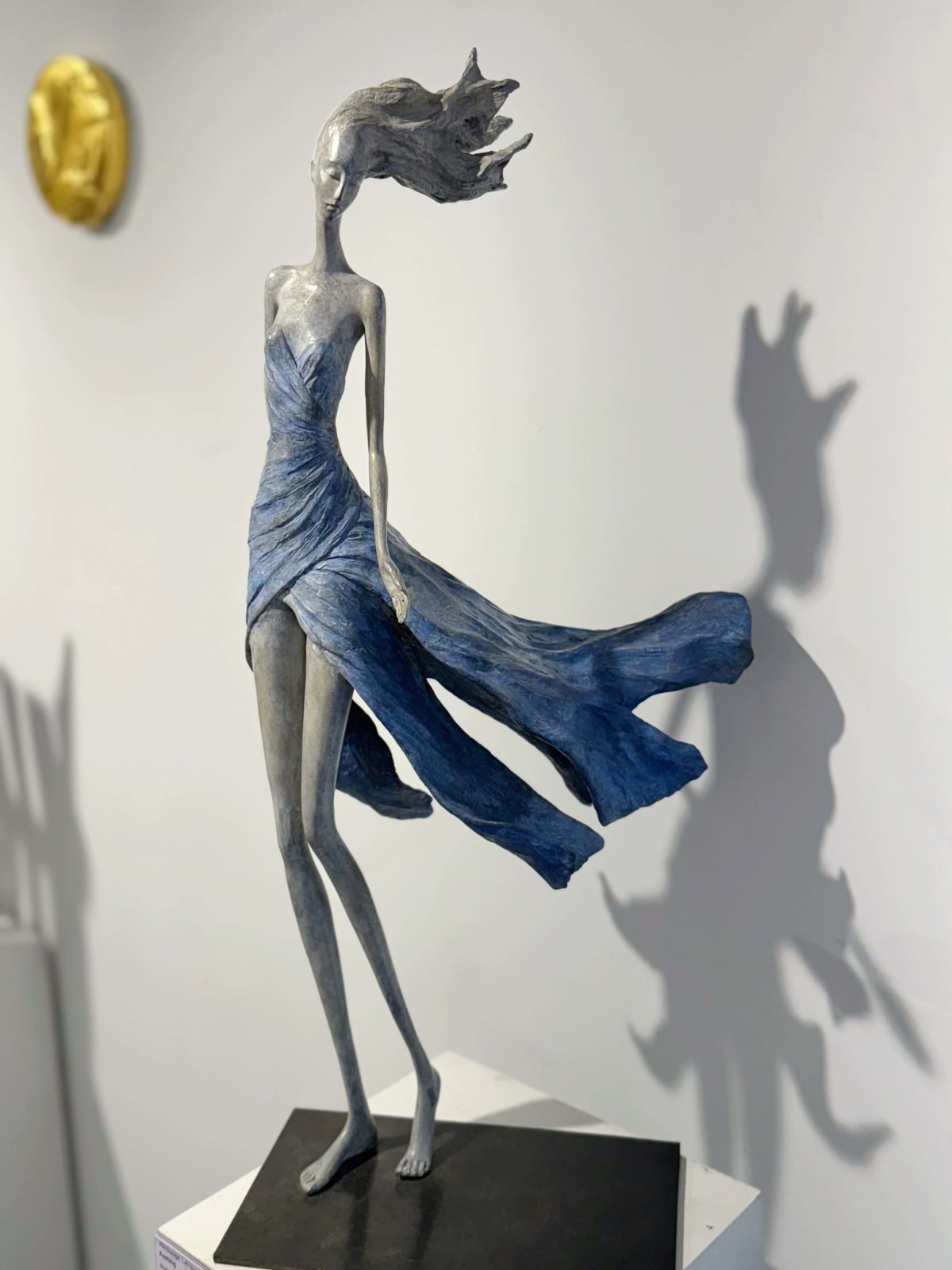 Feelings woman sculpture Hedwige Leroux contemporary sculpture bronze sculpture woman with hair blowing into the wind interior design at hotel Barsey by Warwick Art Yi gallery Brussels art gallery