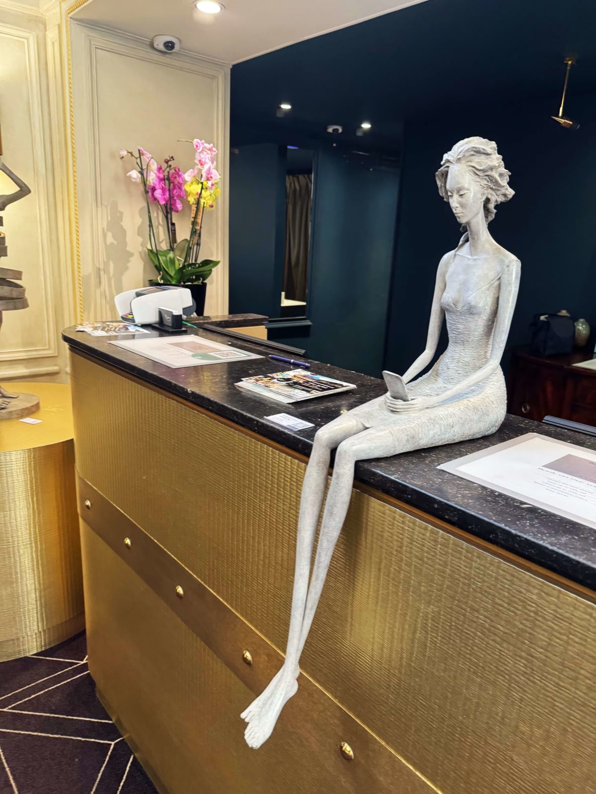answer me woman sculpture Hedwige Leroux contemporary sculpture bronze sculpture woman with hair blowing into the wind interior design at hotel Barsey by Warwick Art Yi gallery Brussels art gallery