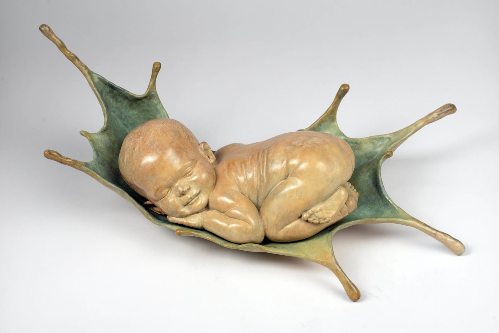 sweet dreams baby sculpture Liang Binbin cute baby sleeping on blue water bronze sculpture contemporary sculpture Art Yi gallery Brussels art gallery