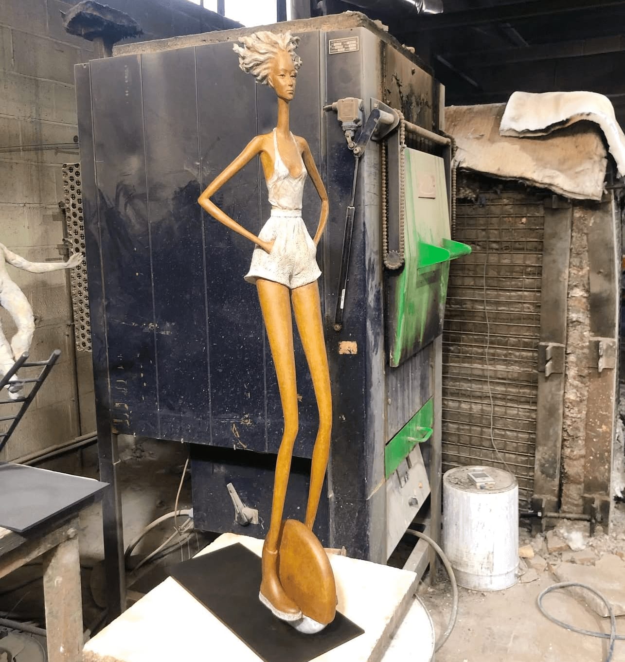urban freedom hedwige leroux a beautiful and fine contemporary city girl bronze sculpture walking on street