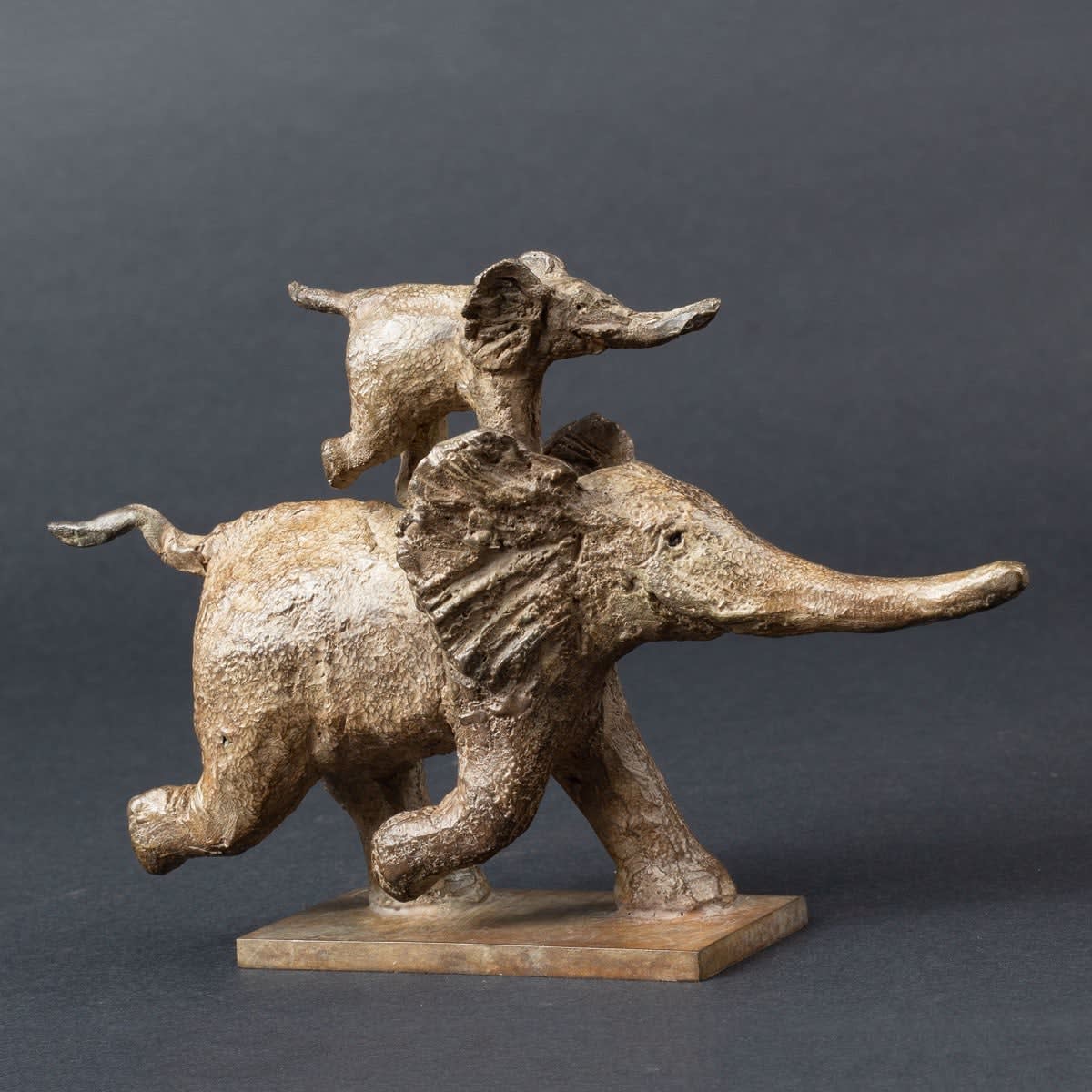 run there fast running elephant cute lovely happy contemporary bronze animal sculpture in love garden interior design sophie verger