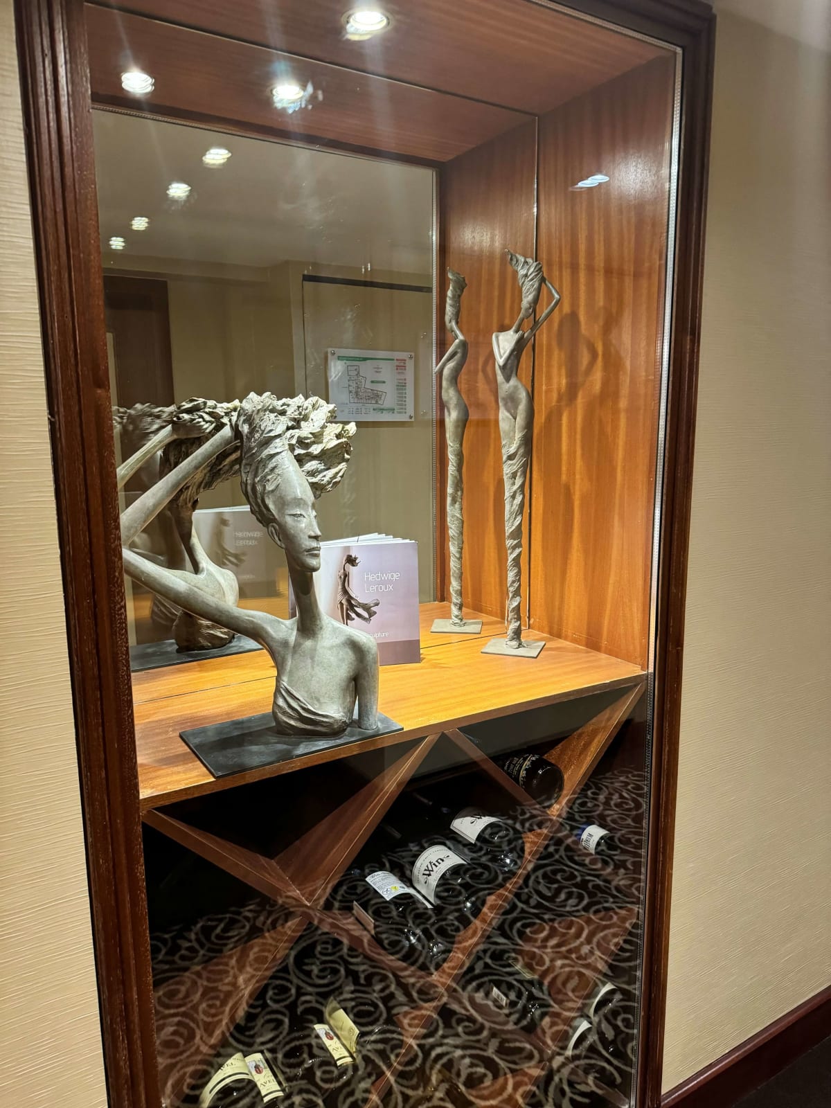 windy woman sculpture Hedwige Leroux contemporary sculpture bronze sculpture woman with hair blowing into the wind interior design at hotel Barsey by Warwick Art Yi gallery Brussels art gallery