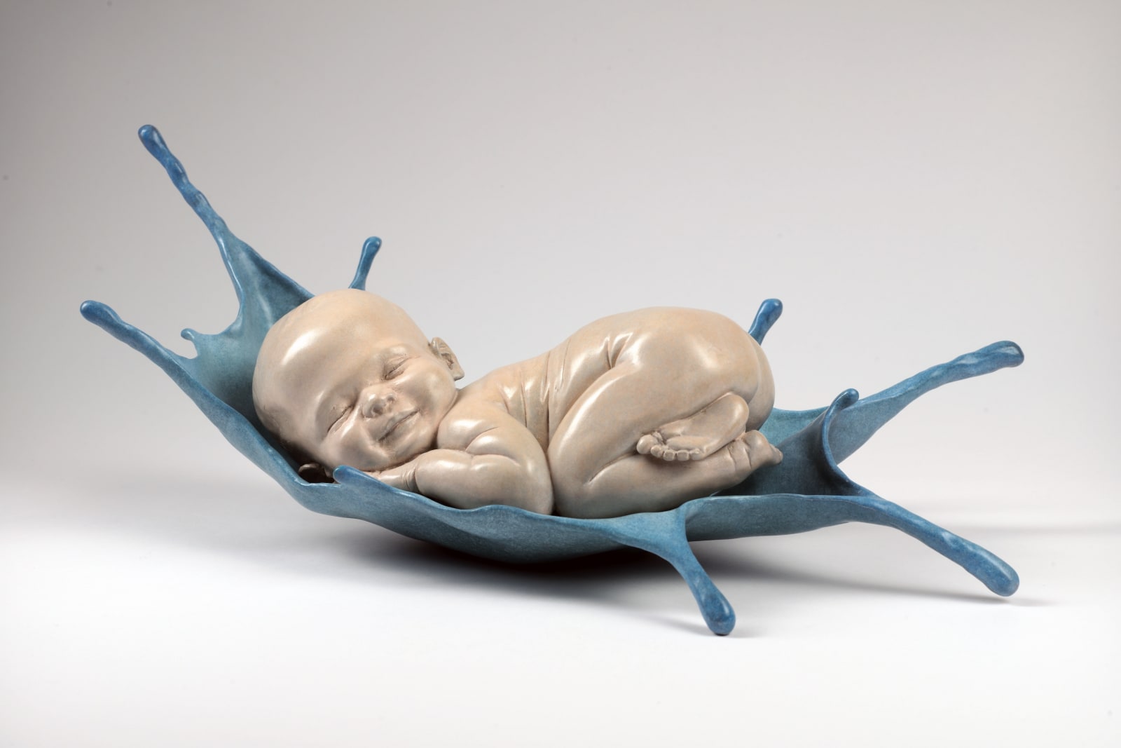 sweet dreams baby sculpture Liang Binbin cute baby sleeping on blue water bronze sculpture contemporary sculpture Art Yi gallery Brussels art gallery