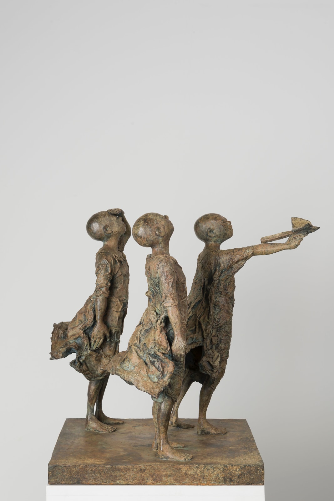 Once we'll be pilot lieven d'haese contemporary bronze sculpture boys throw paper airplane into the sky fly sculpture garden sculpture art garden design Art Yi child sculpture childhood dream art gallery in brussels