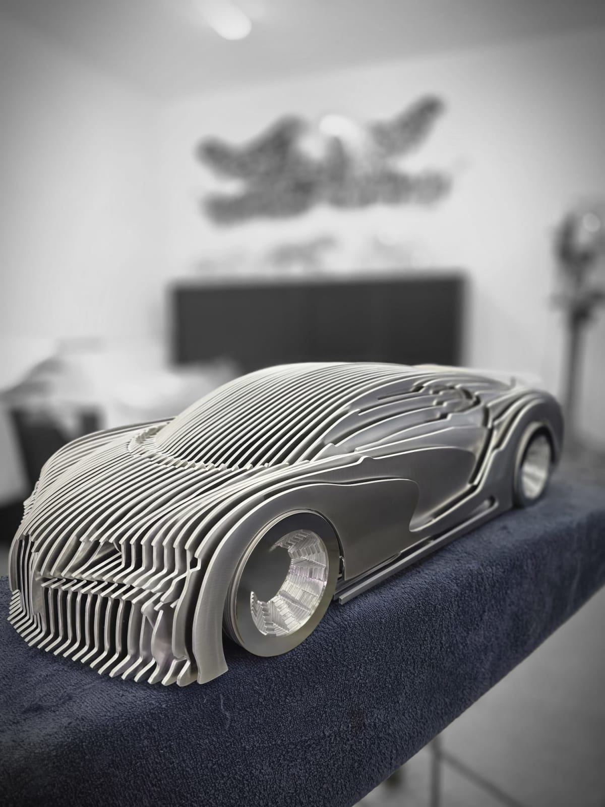 Chirona silver luxury racing car sculpture Jean Paul Kala contemporary car sculpture Art Yi gallery Brussels art gallery
