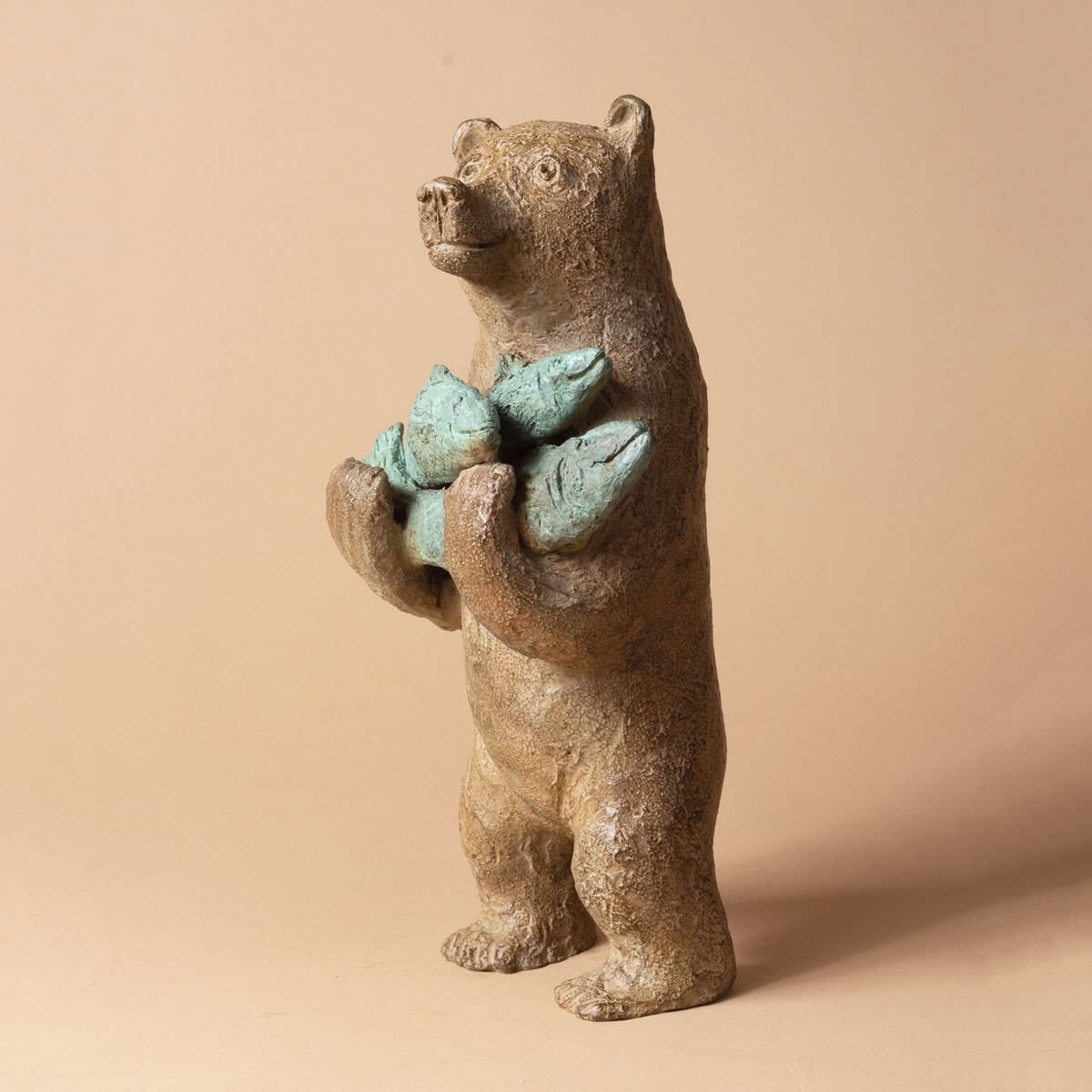 A bear with three fishes Sophie Verger lovely bear sculpture animal sculpture bronze sculpture a little brown bear is so happy to cary his three fishes Art Yi gallery Brussels art gallery