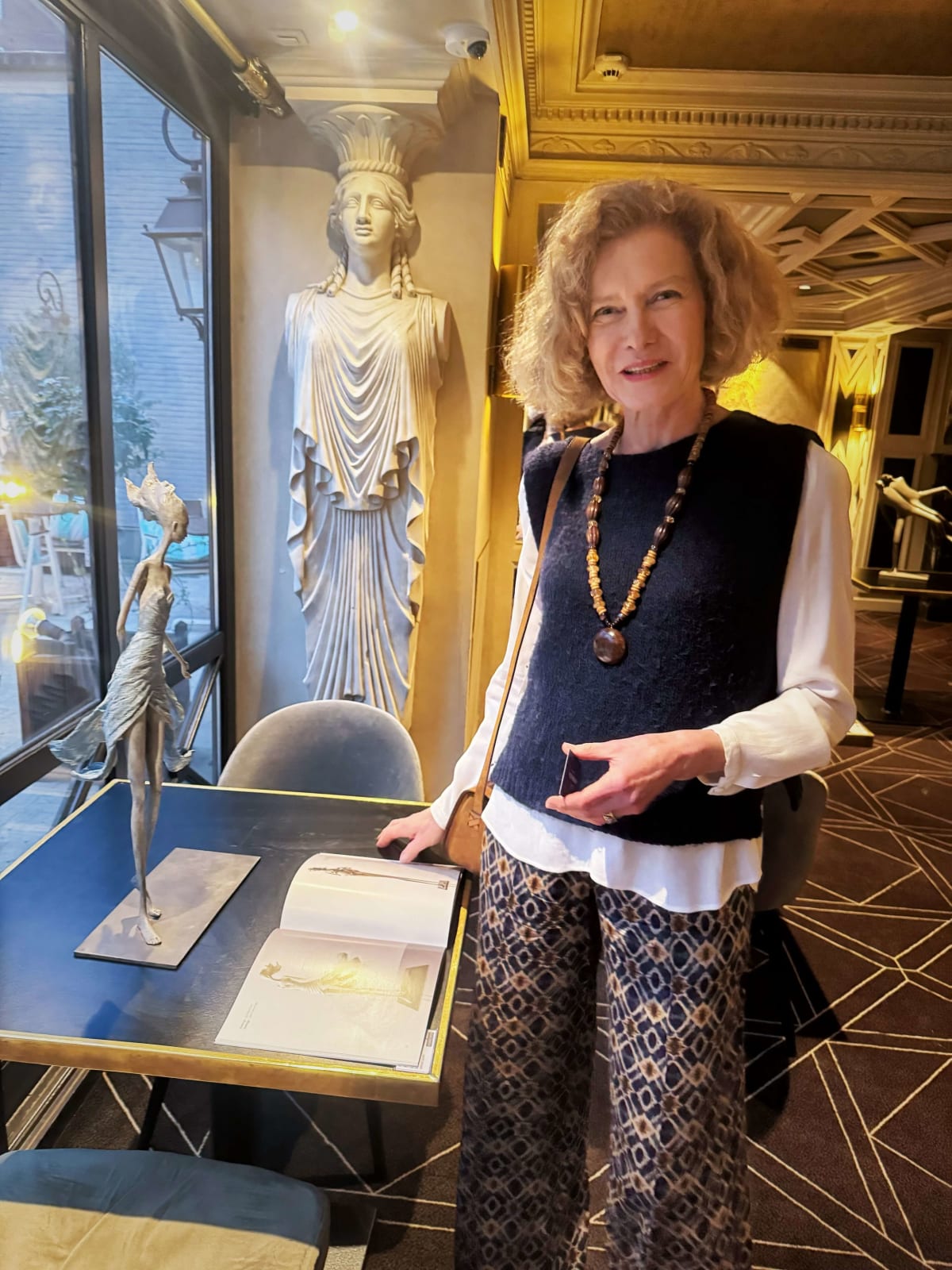 Feelings woman sculpture Hedwige Leroux contemporary sculpture bronze sculpture woman with hair blowing into the wind interior design at hotel Barsey by Warwick Art Yi gallery Brussels art gallery
