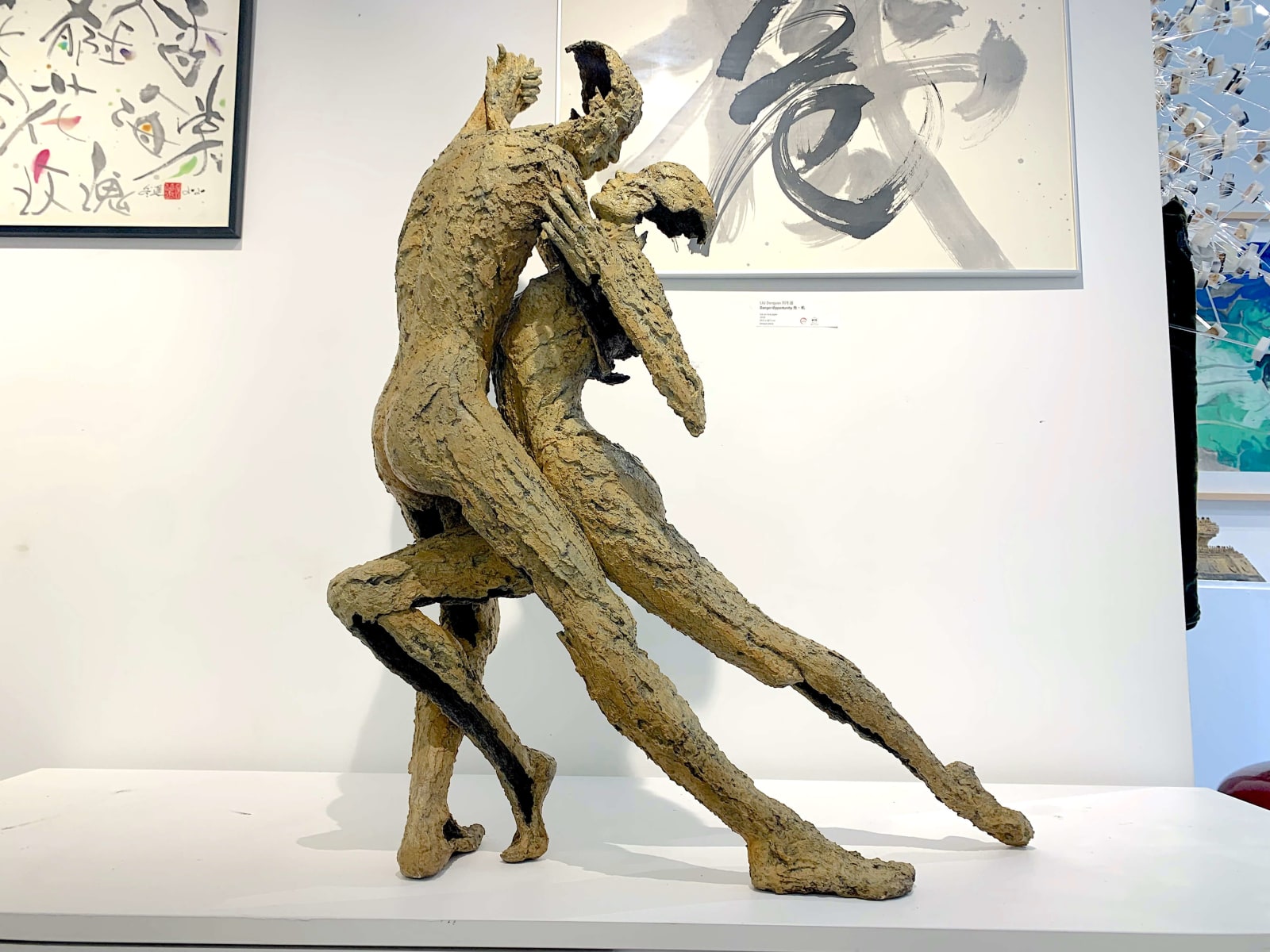 a couple in love dance tango sculpture jacques van den abeele art gallery brussels
