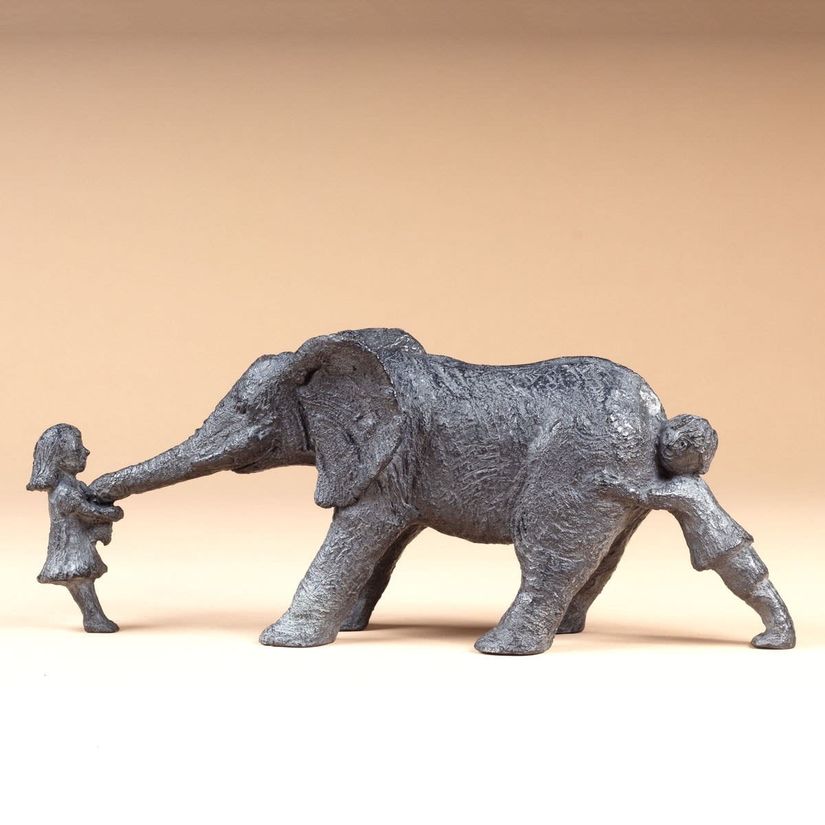 Two children with baby elephant cute contemporary bronze sculpture garden interior design sophie verger