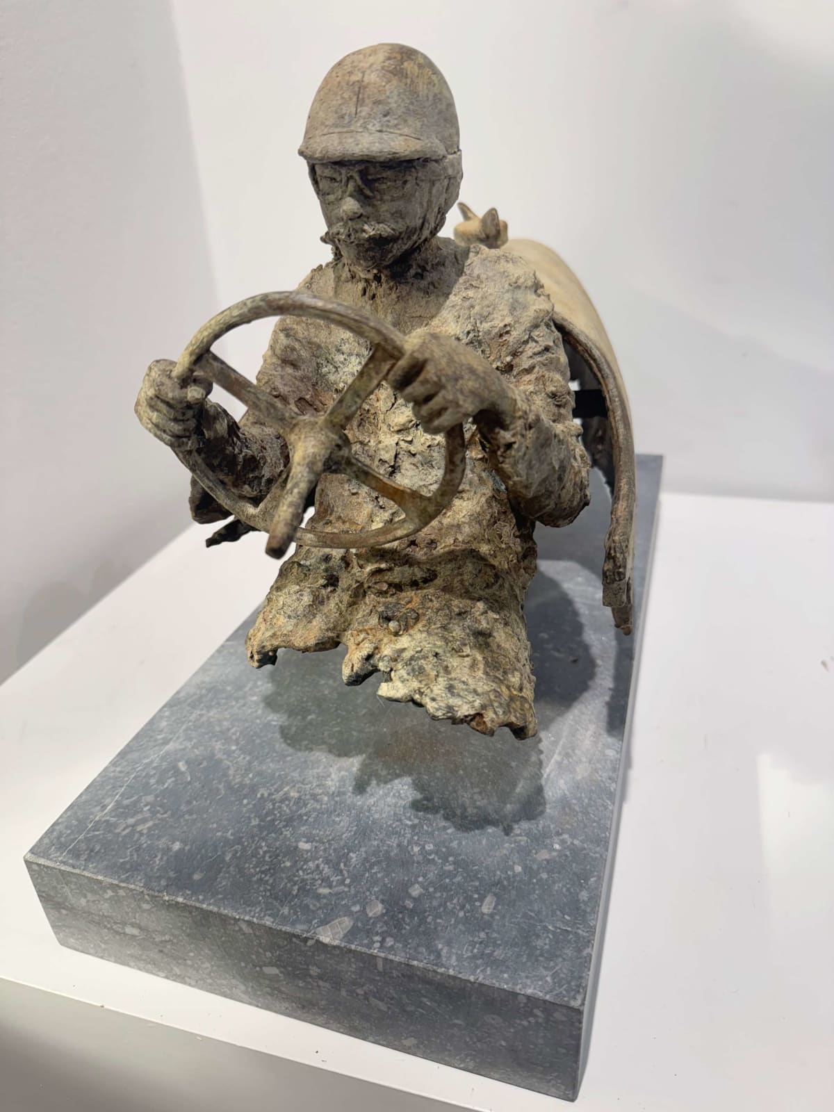 master of speed racing car sculpture of Lieven D'Haese a boy is driving a racing car contemporary sculpture bronze sculpture Art Yi Gallery Brussels art gallery