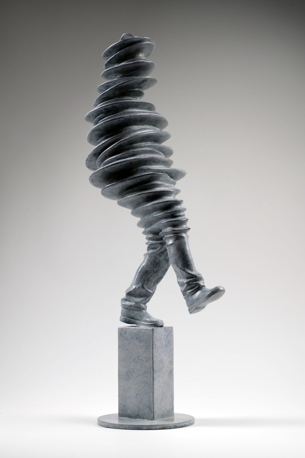 Walkman contemporary sculpture Liang Binbin a light grey bronze sculpture of a man walking and jumping in the rain with shadow figurative sculpture Art Yi gallery Brussels art gallery